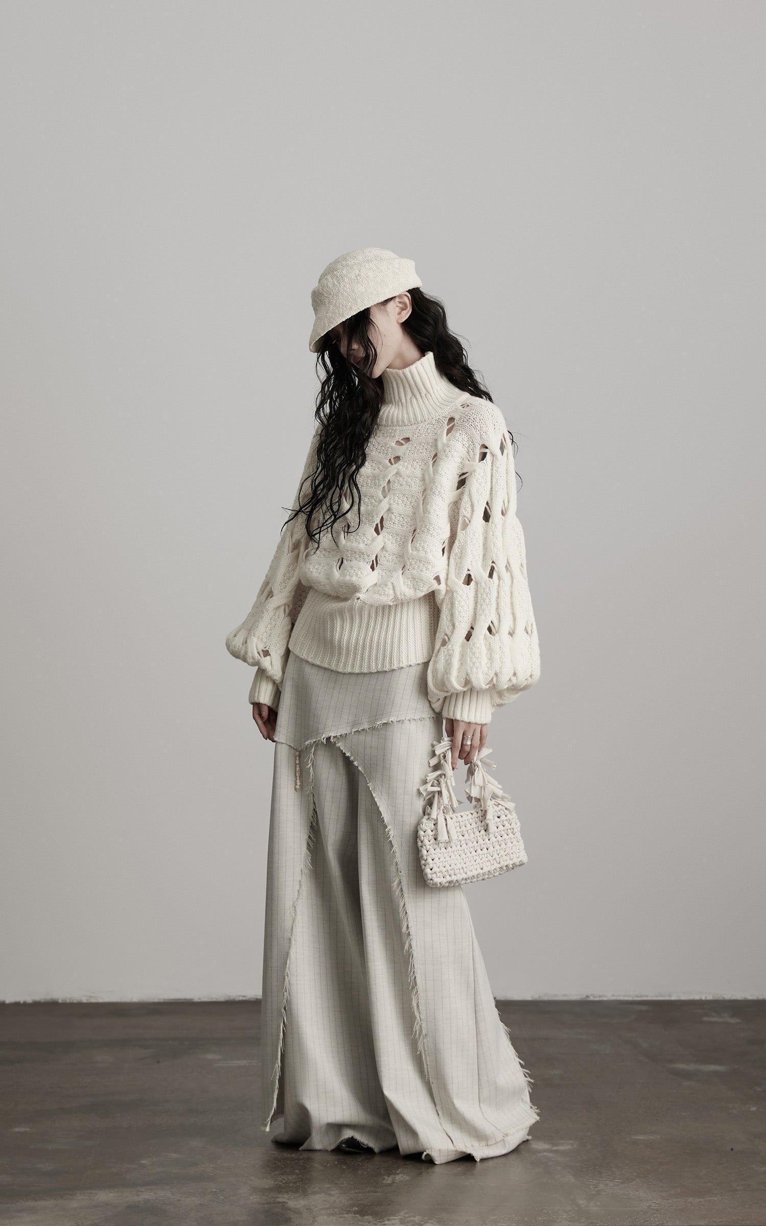 INDULGE Braided Void Turtleneck Sweater