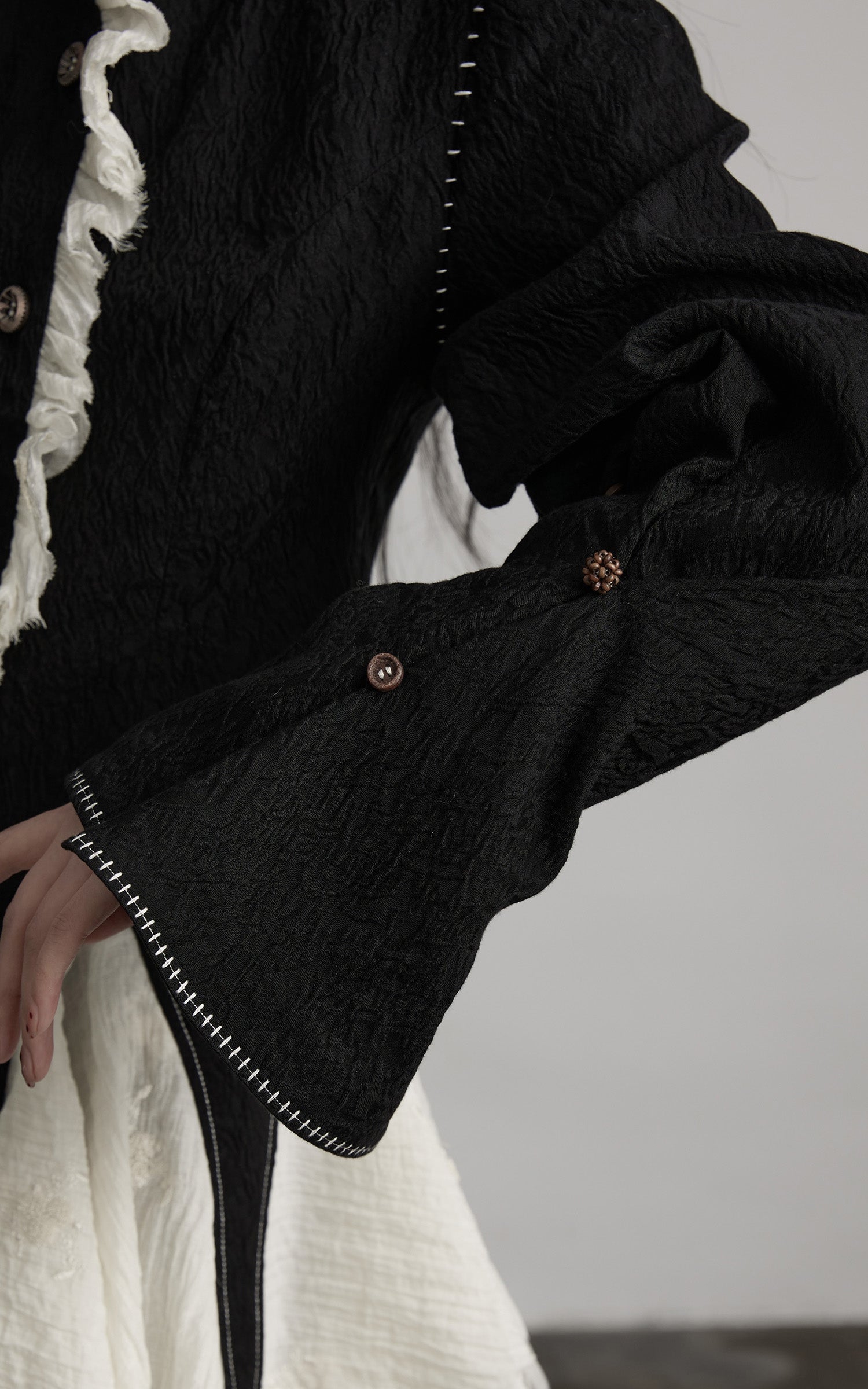 INDULGE Structured Crinkle Sculptural Peplum Jacket