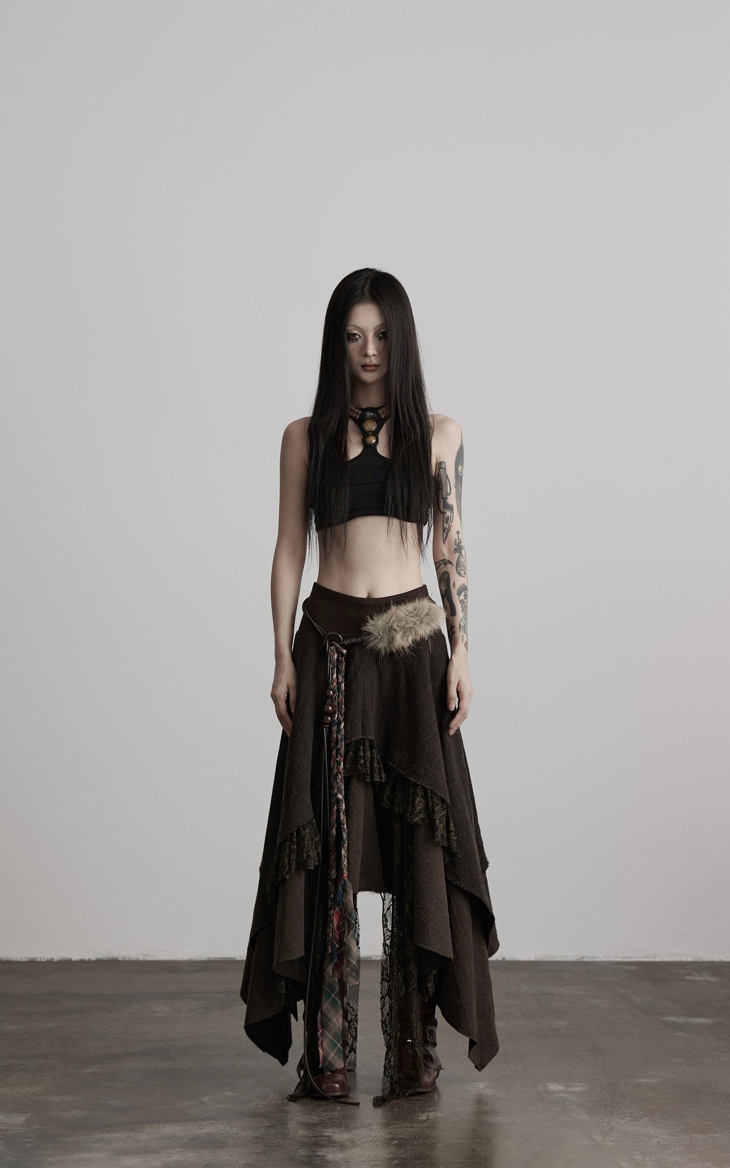 INDULGE Layered Asymmetric Skirt with Braided Belt and Fur Accent
