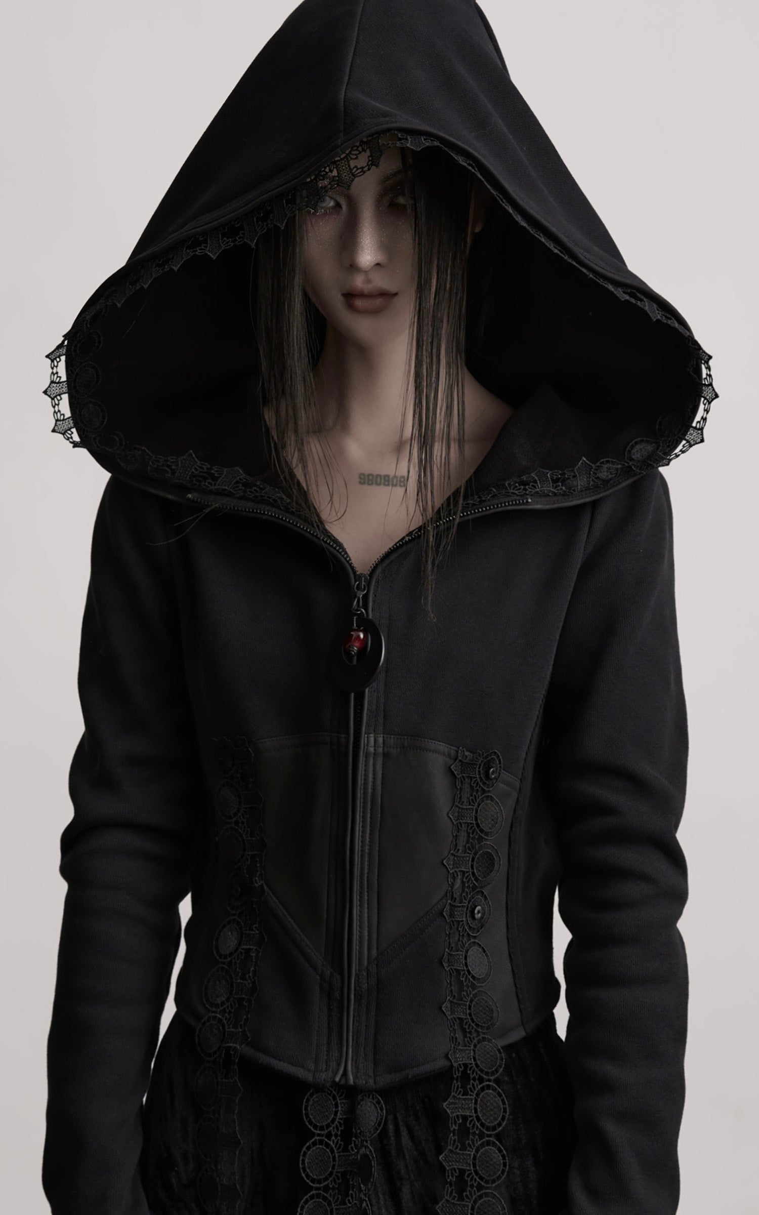INDULGE Long-Hood Gothic Jacket with Lace Trim and Sculpted Corset Detail