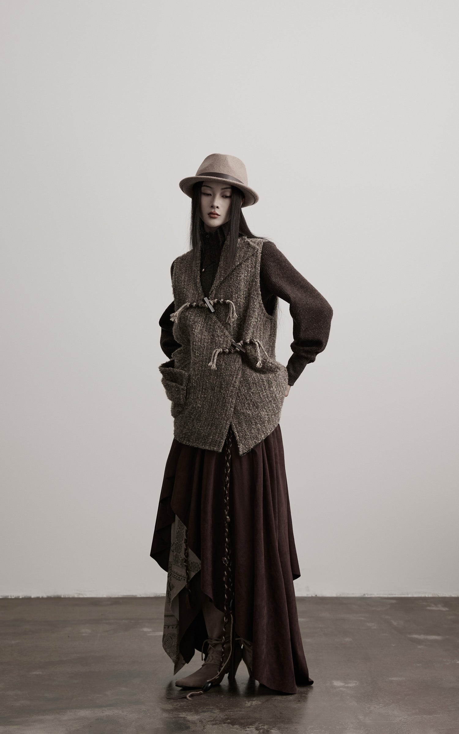 INDULGE Textured Wool Vest with Asymmetric Panels and Hand-Tied Toggle Details