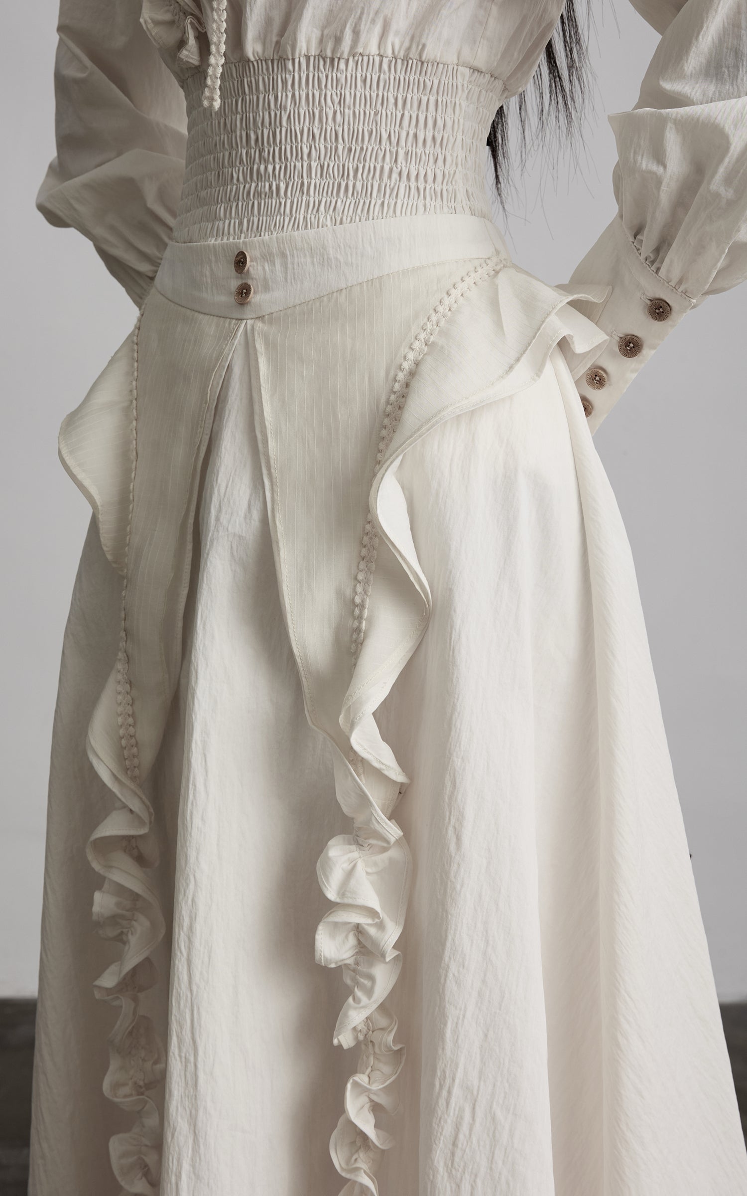 DOINDULGE Sculptural Ruffle Panel High-Waist Long Skirt