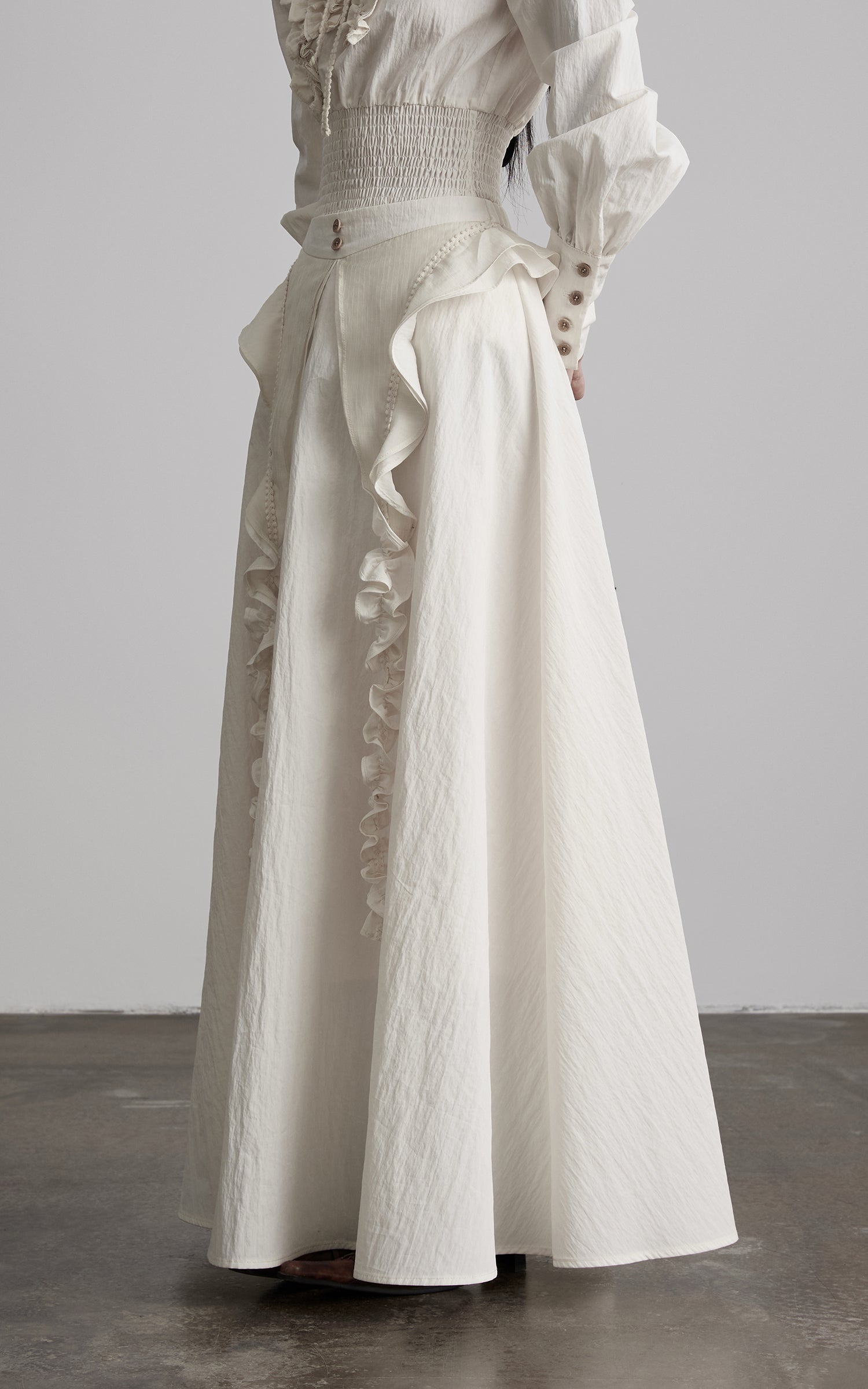 DOINDULGE Sculptural Ruffle Panel High-Waist Long Skirt