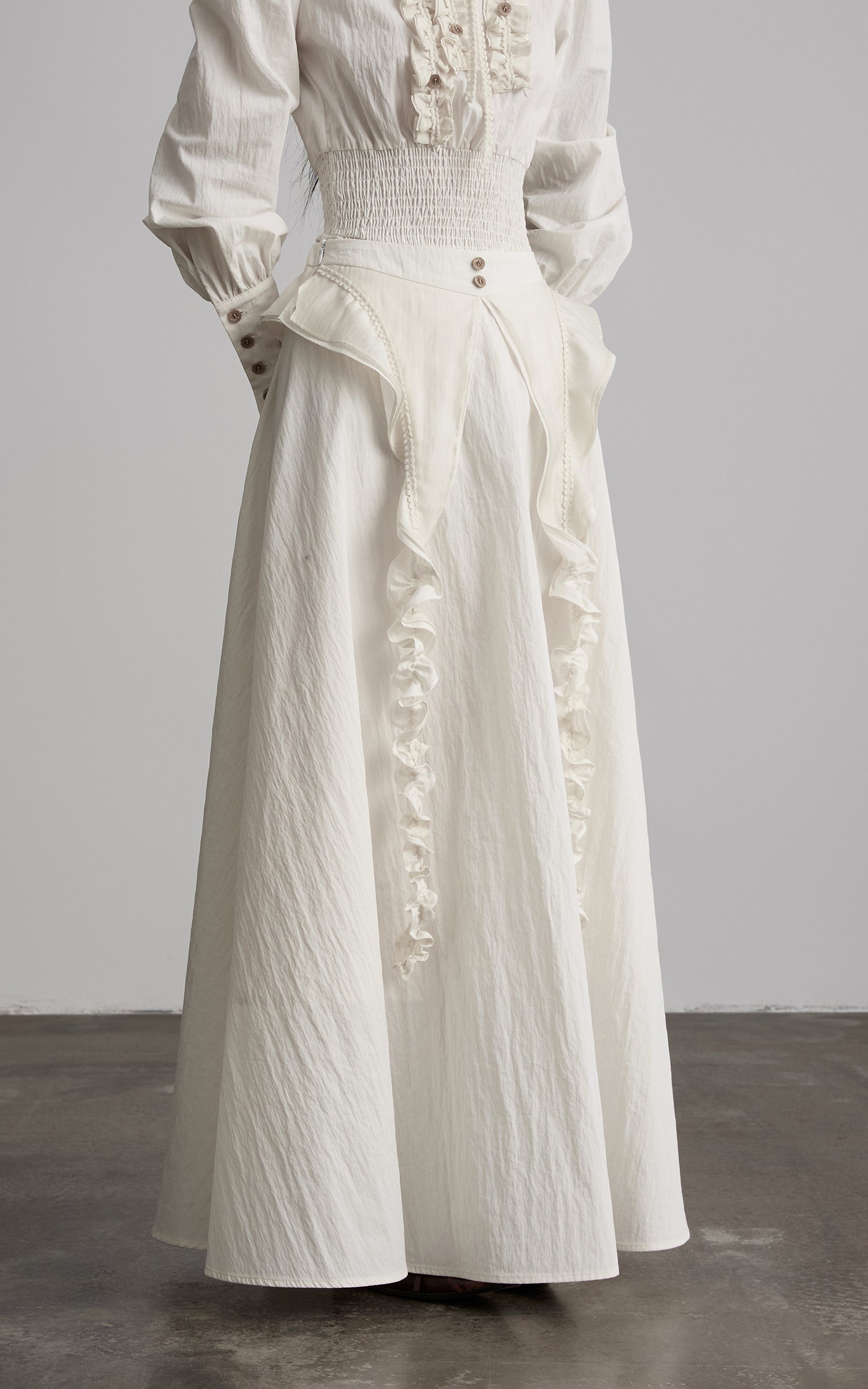 DOINDULGE Sculptural Ruffle Panel High-Waist Long Skirt