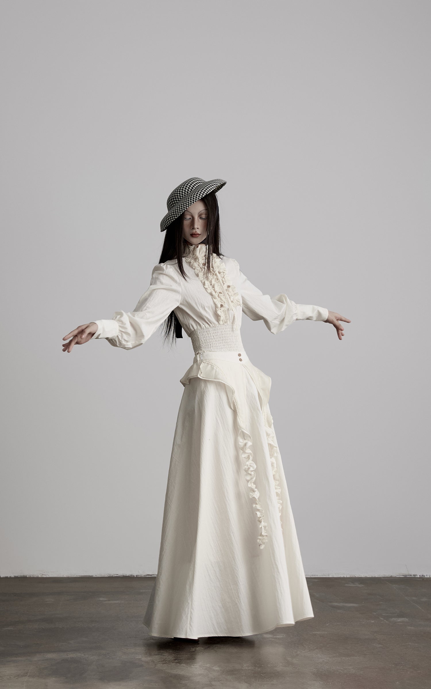 DOINDULGE Sculptural Ruffle Panel High-Waist Long Skirt