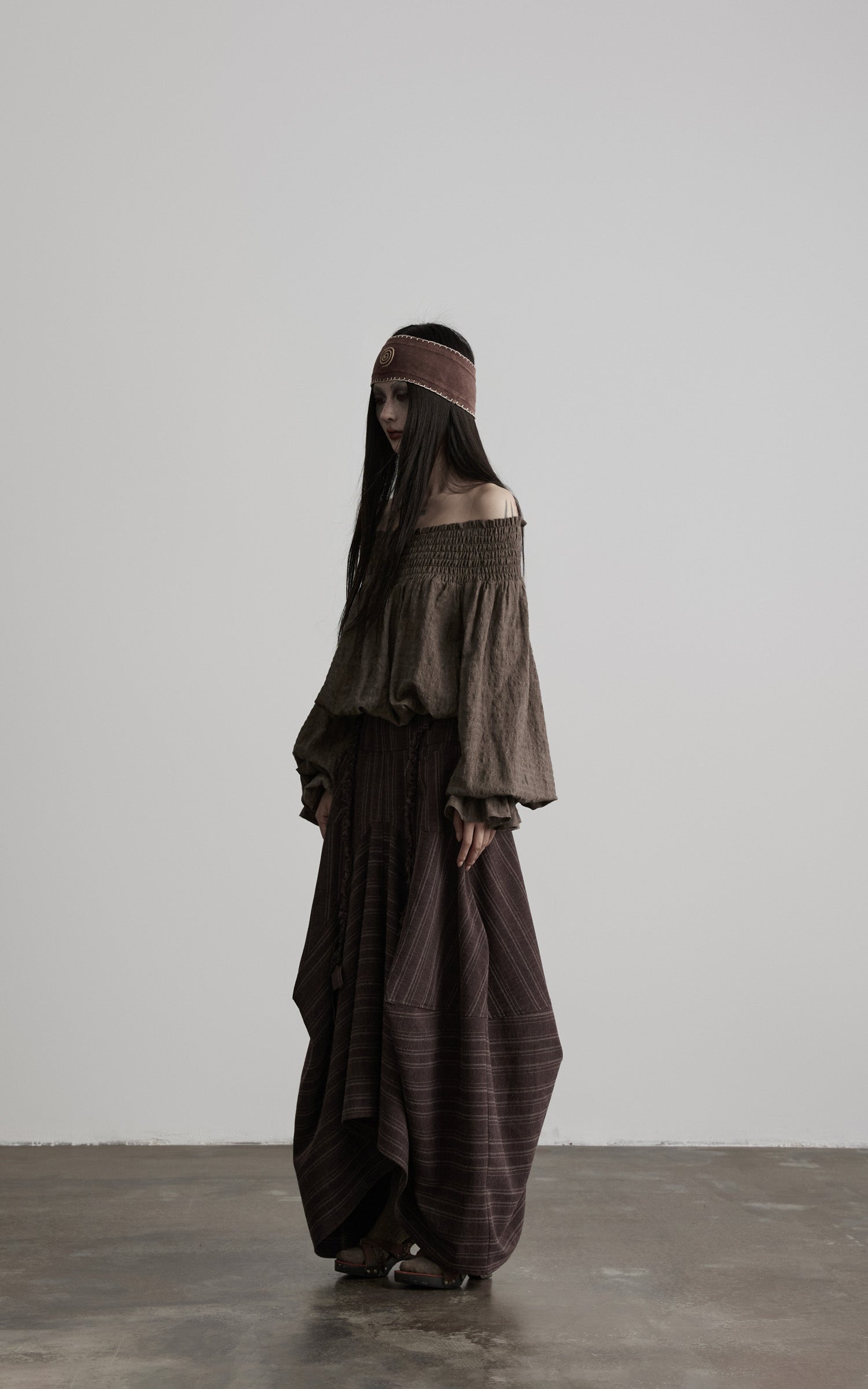 DOINDULGE Shadow Stripe Asymmetric Draped Skirt with Raw Braided Details