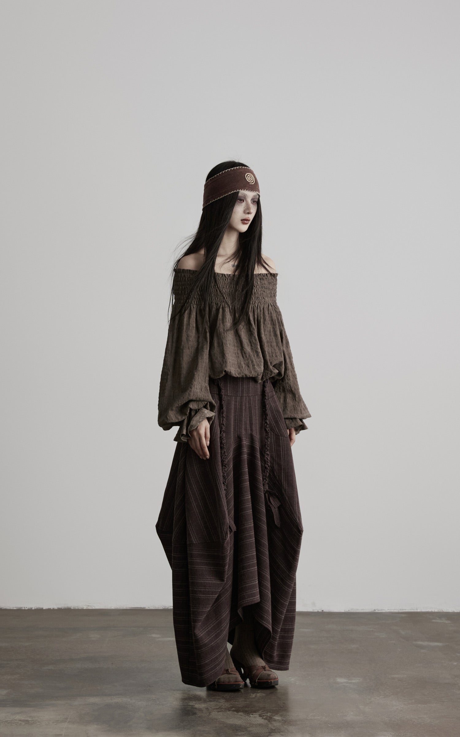 DOINDULGE Shadow Stripe Asymmetric Draped Skirt with Raw Braided Details