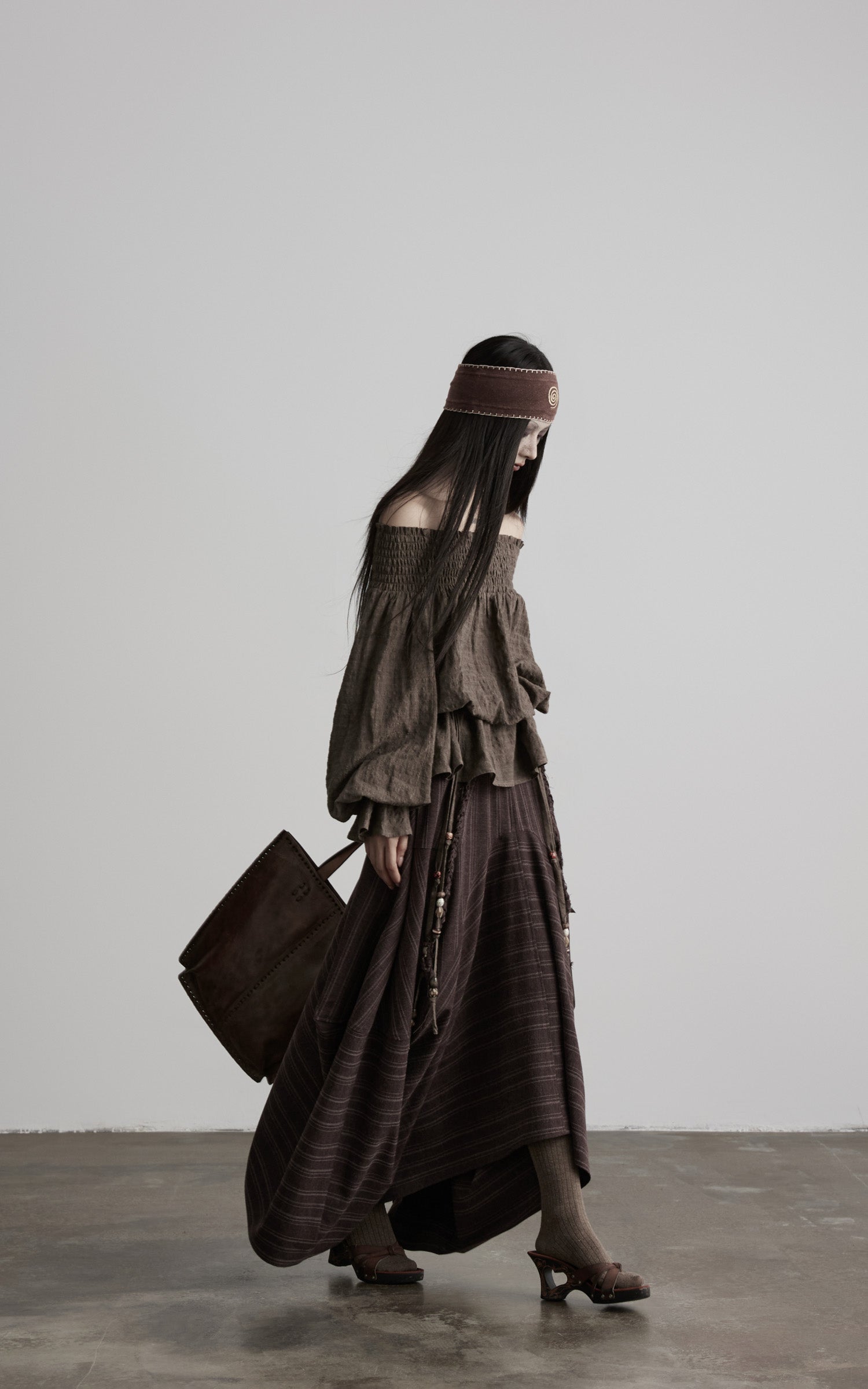 DOINDULGE Shadow Stripe Asymmetric Draped Skirt with Raw Braided Details