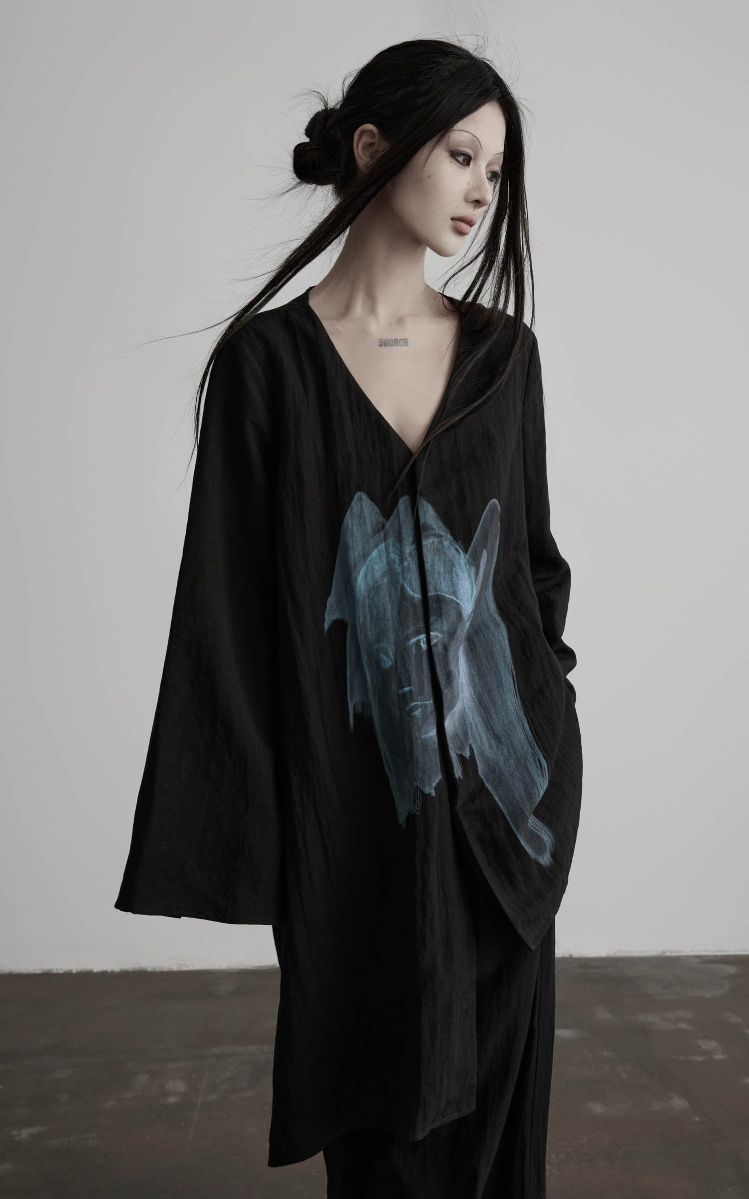 DOINDULGE Asymmetric V-Neck Printed Shirt