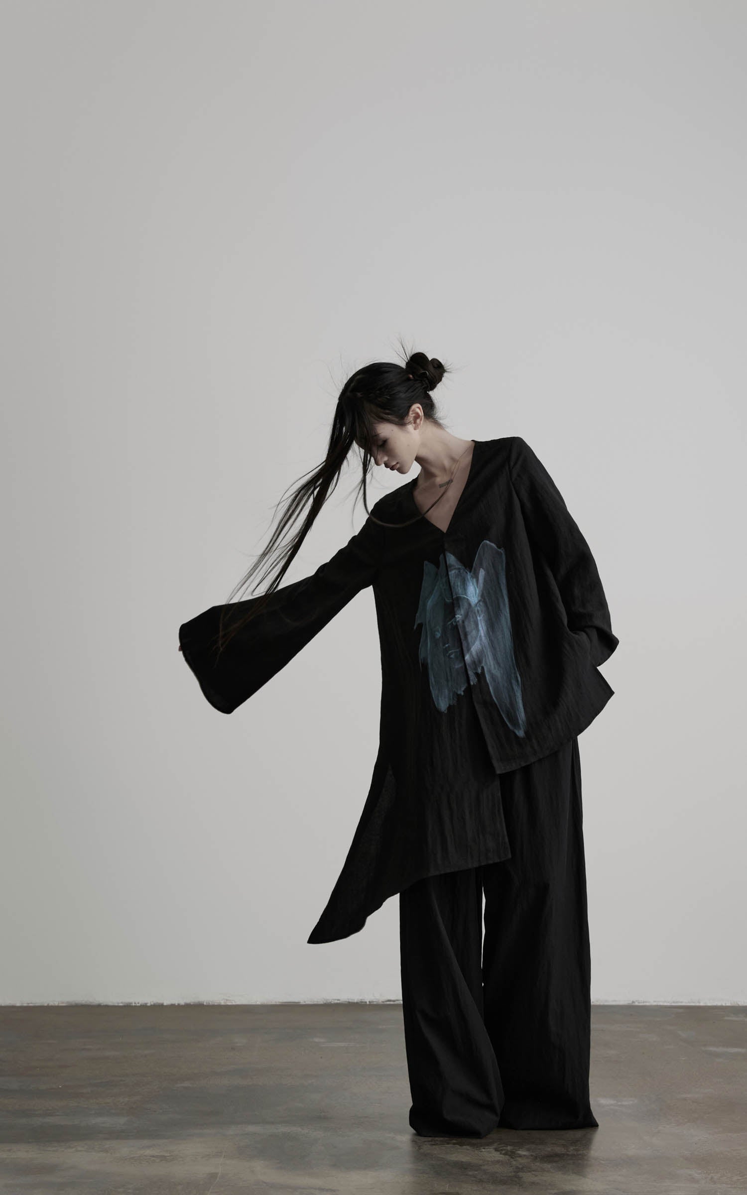 DOINDULGE Asymmetric V-Neck Printed Shirt