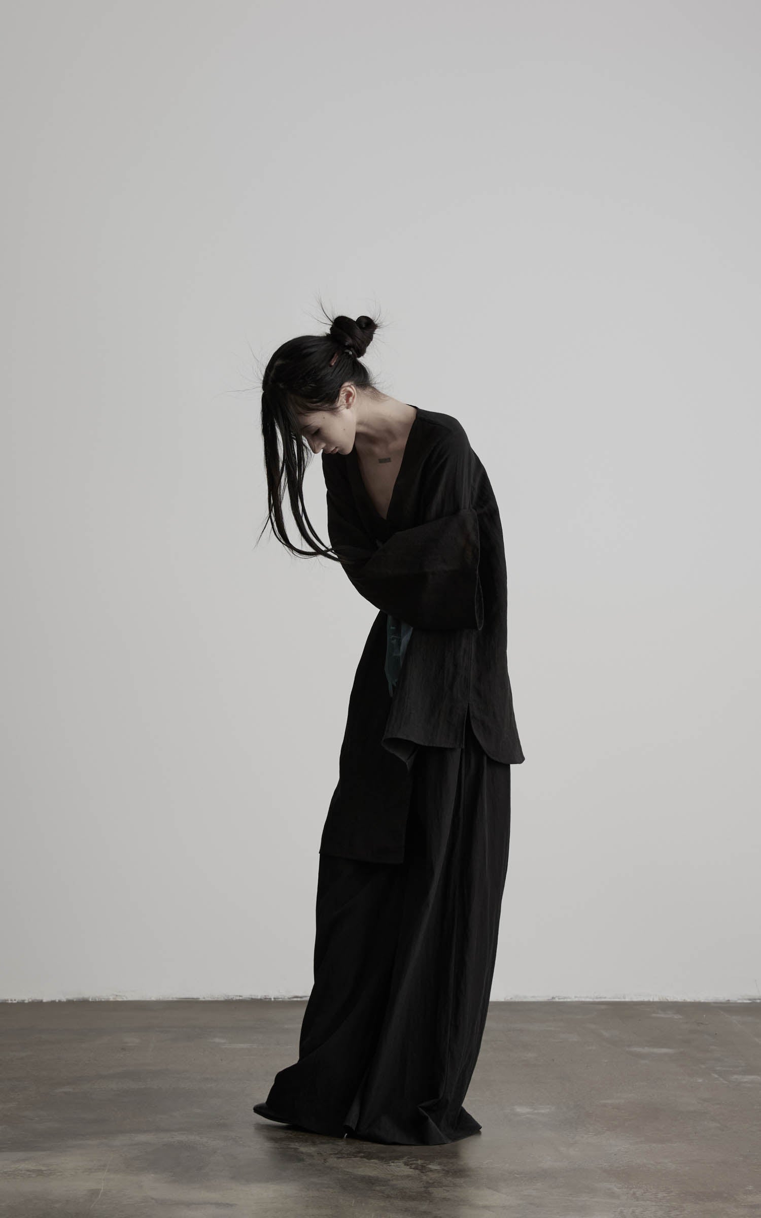 DOINDULGE Asymmetric V-Neck Printed Shirt