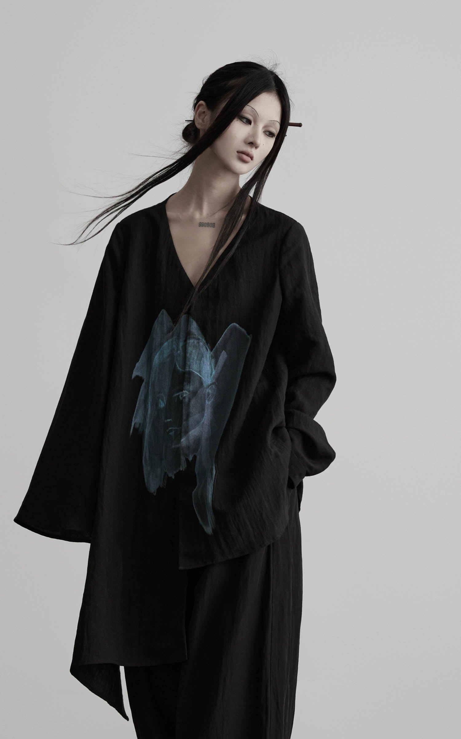 DOINDULGE Asymmetric V-Neck Printed Shirt