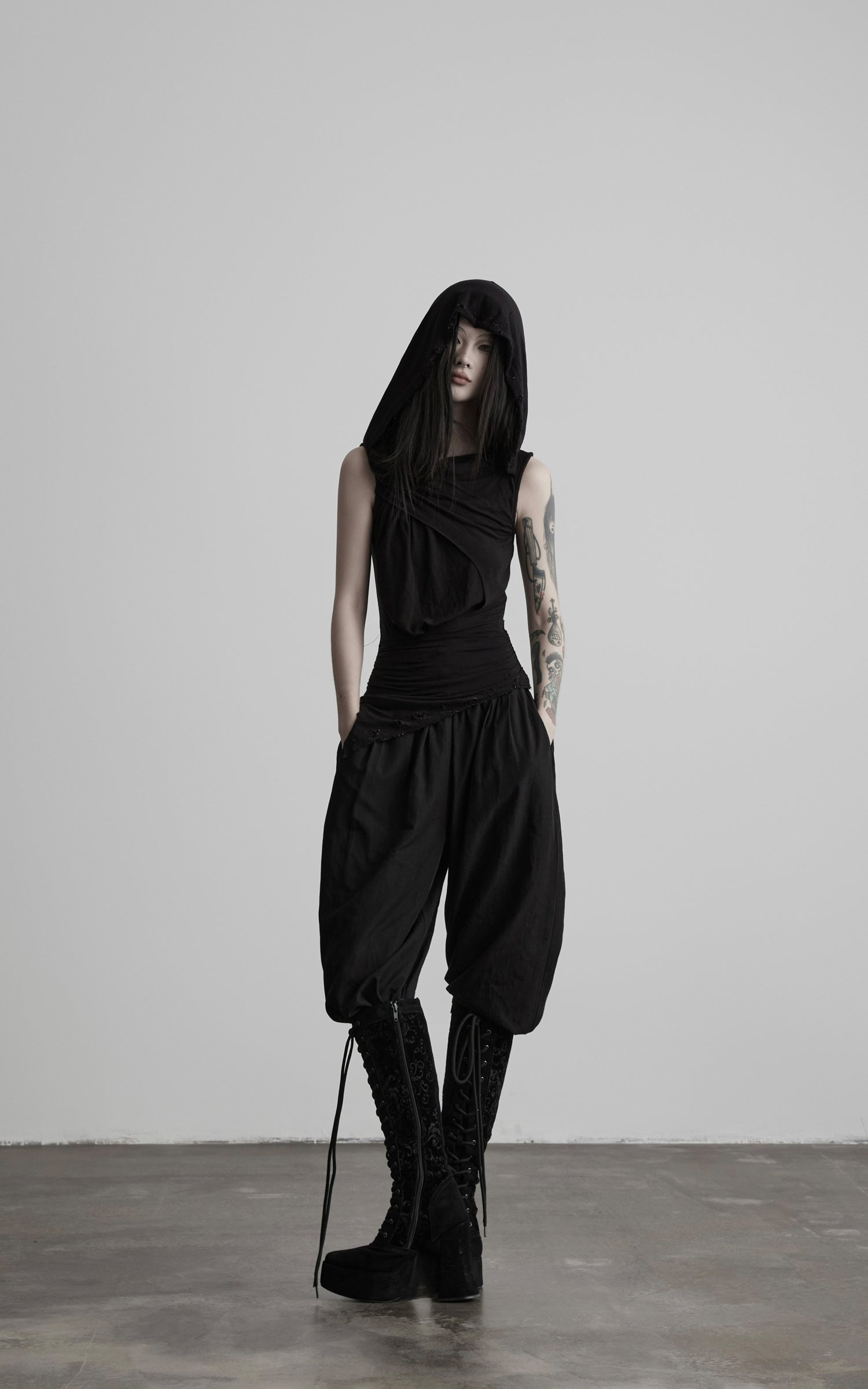 DOINDULGE Hooded Draped Sleeveless Knit Top
