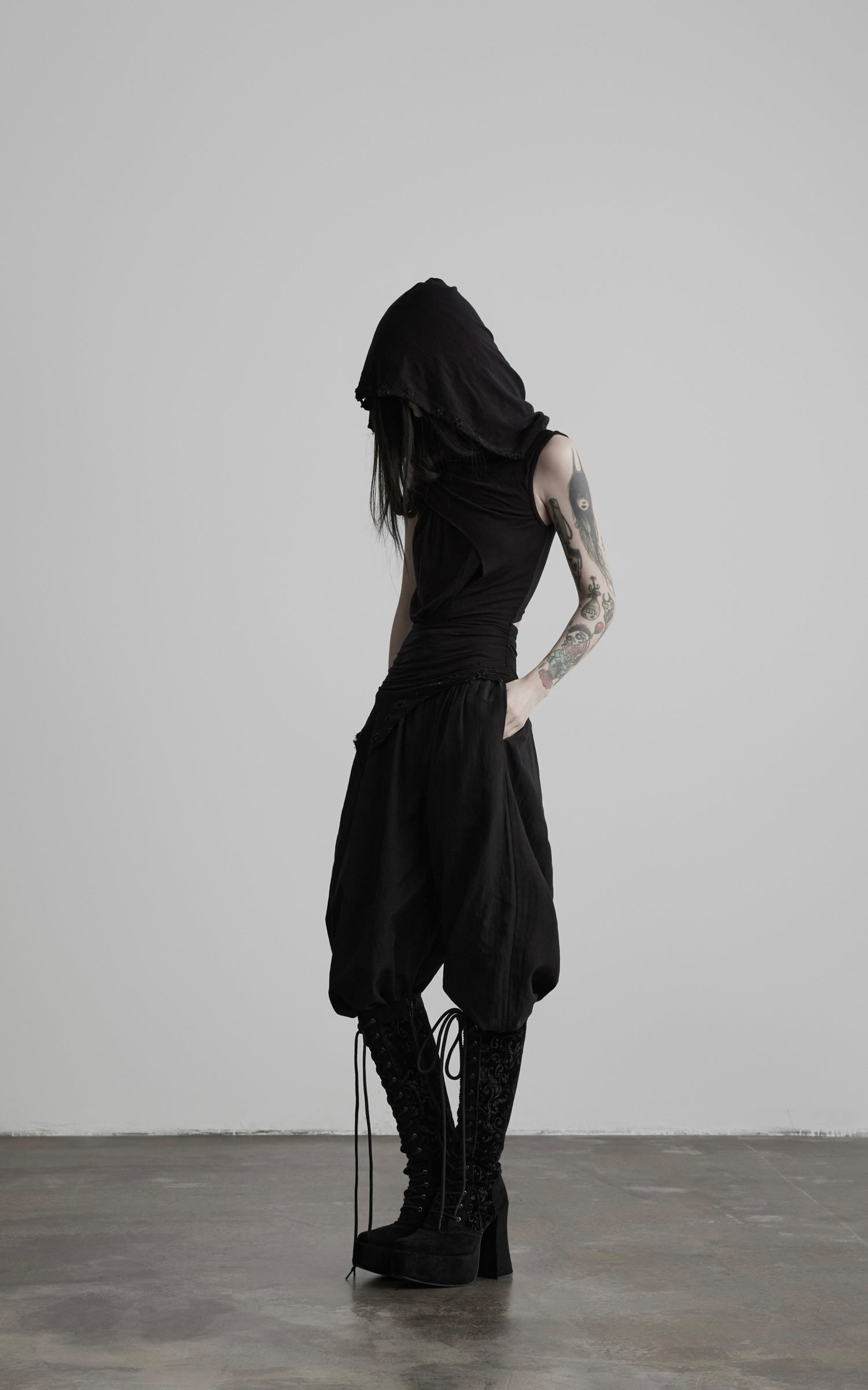 DOINDULGE Hooded Draped Sleeveless Knit Top