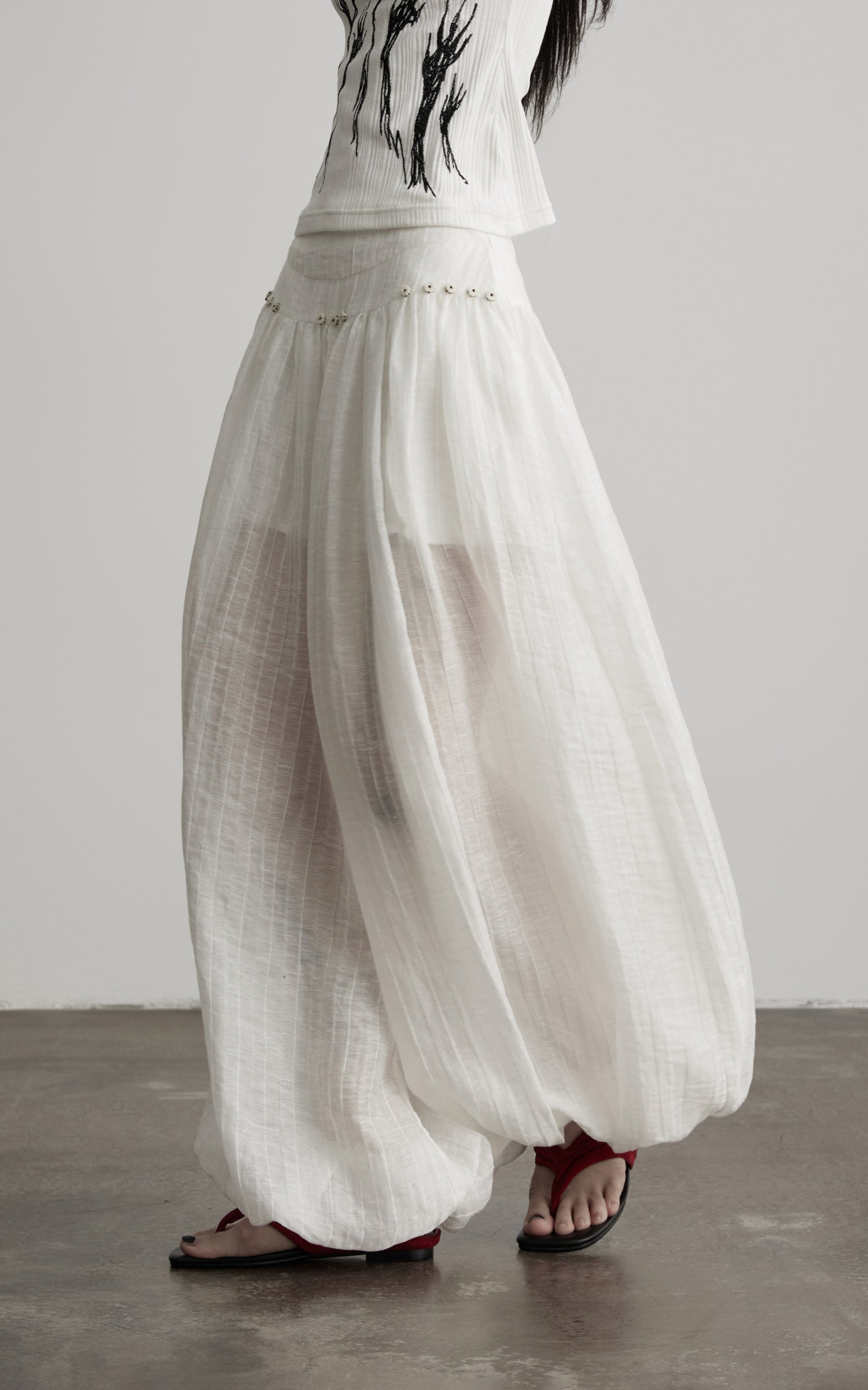 DOINDULGE Low-Rise Sheer Gathered Wide-Leg Pants