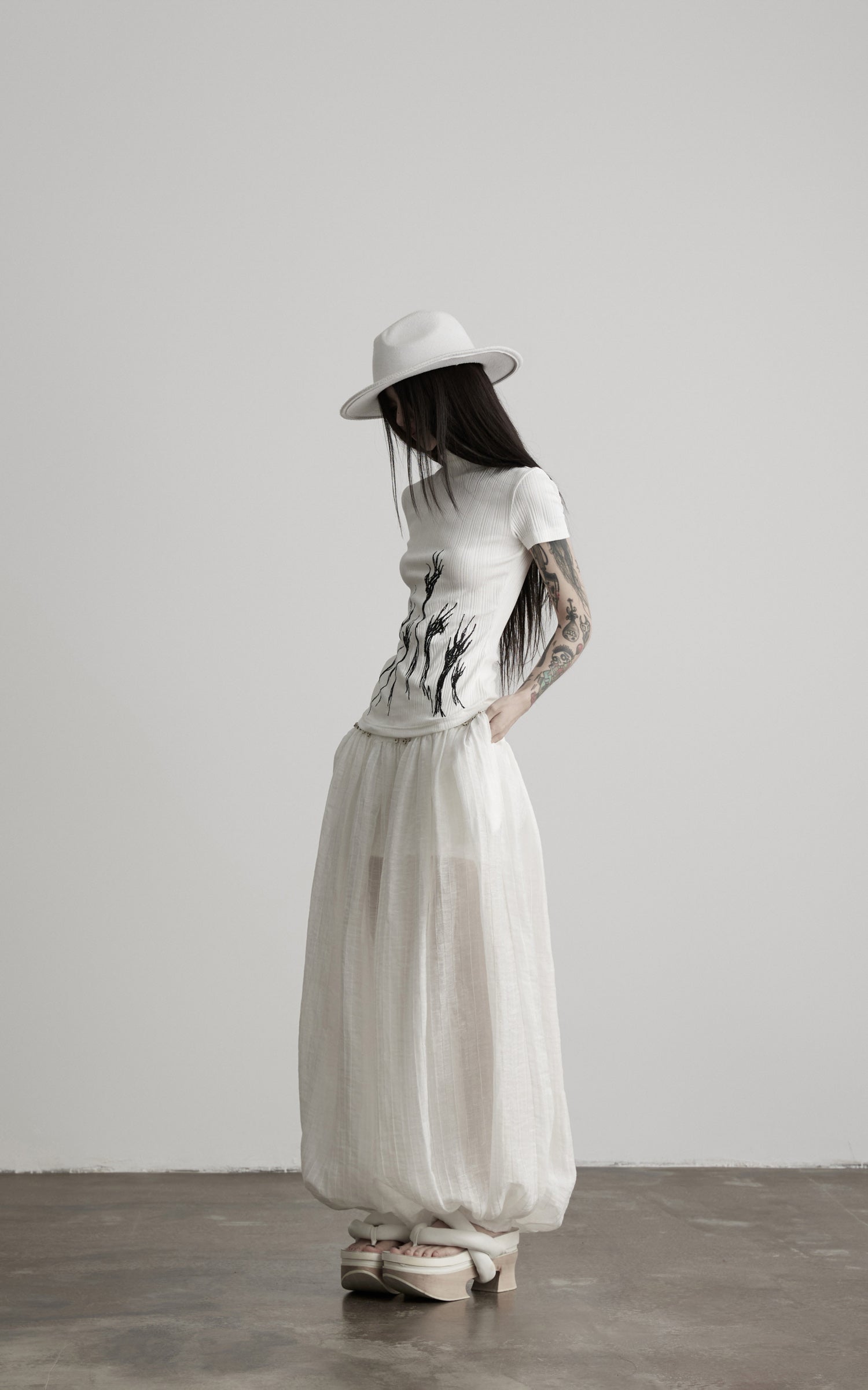 DOINDULGE Low-Rise Sheer Gathered Wide-Leg Pants