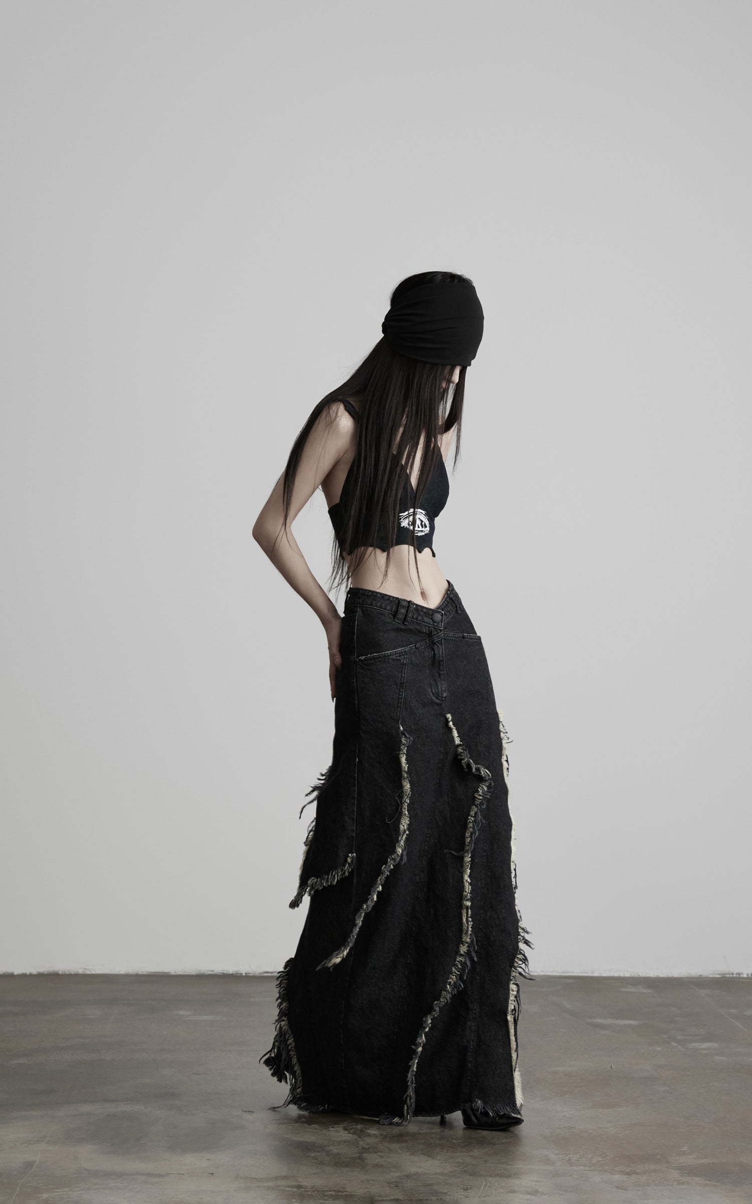 DOINDULGE Low-Rise Frayed Denim Maxi Skirt