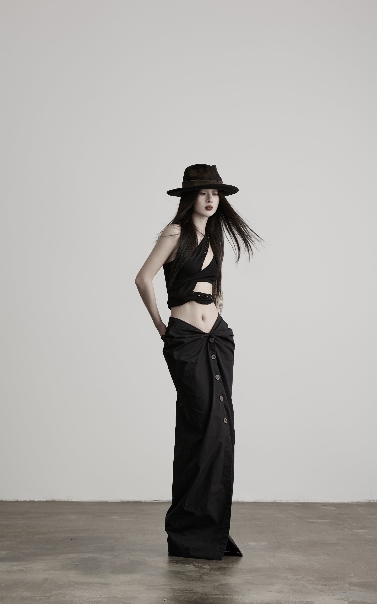 DOINDULGE Asymmetric One-Shoulder Cutout Knit Bodysuit