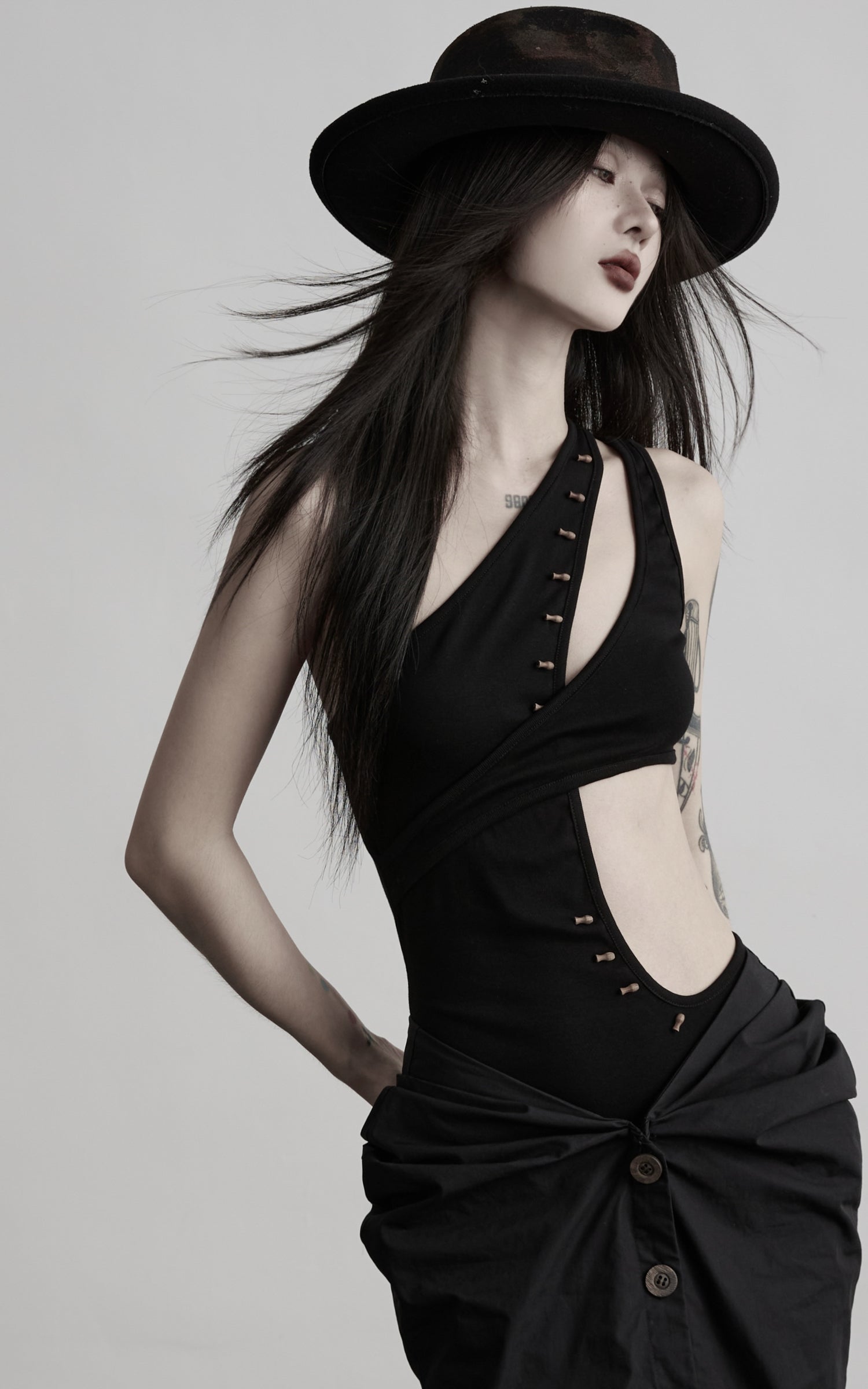 DOINDULGE Asymmetric One-Shoulder Cutout Knit Bodysuit