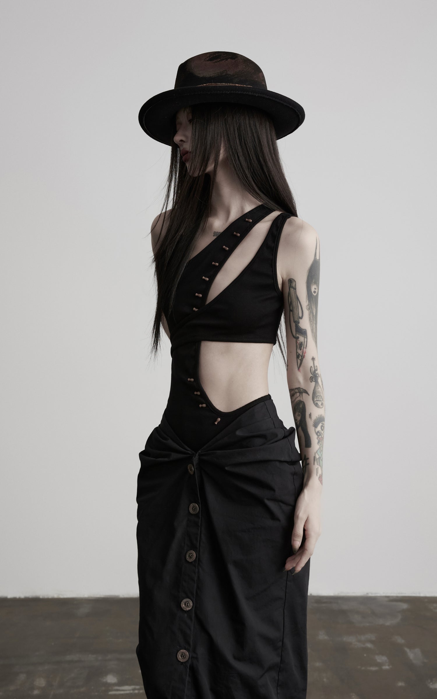 DOINDULGE Asymmetric One-Shoulder Cutout Knit Bodysuit