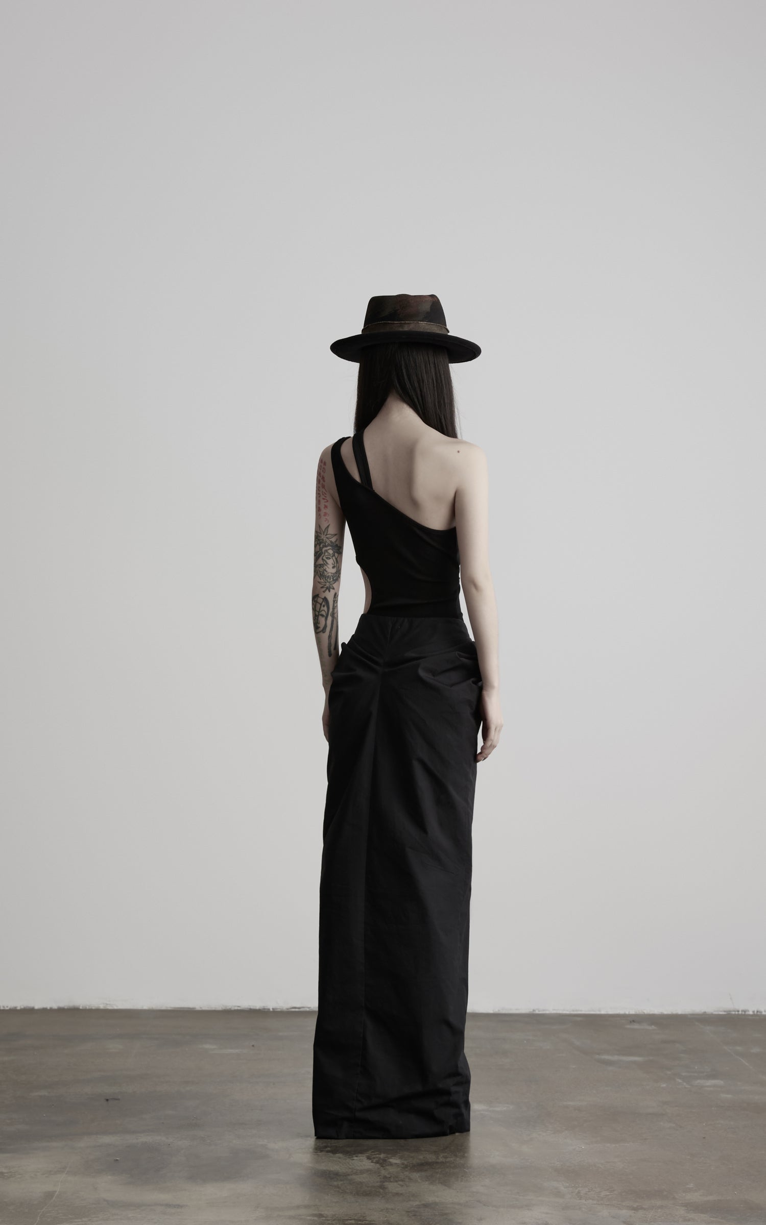 DOINDULGE Asymmetric One-Shoulder Cutout Knit Bodysuit