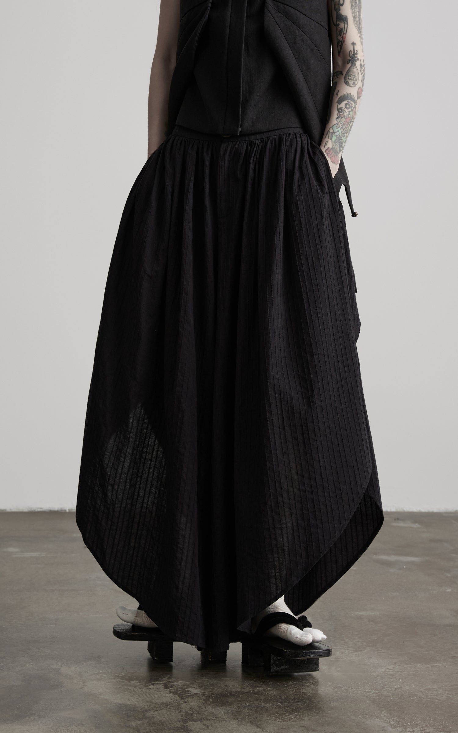 DOINDULGE Asymmetric Textured Wide-Leg Palazzo Pants