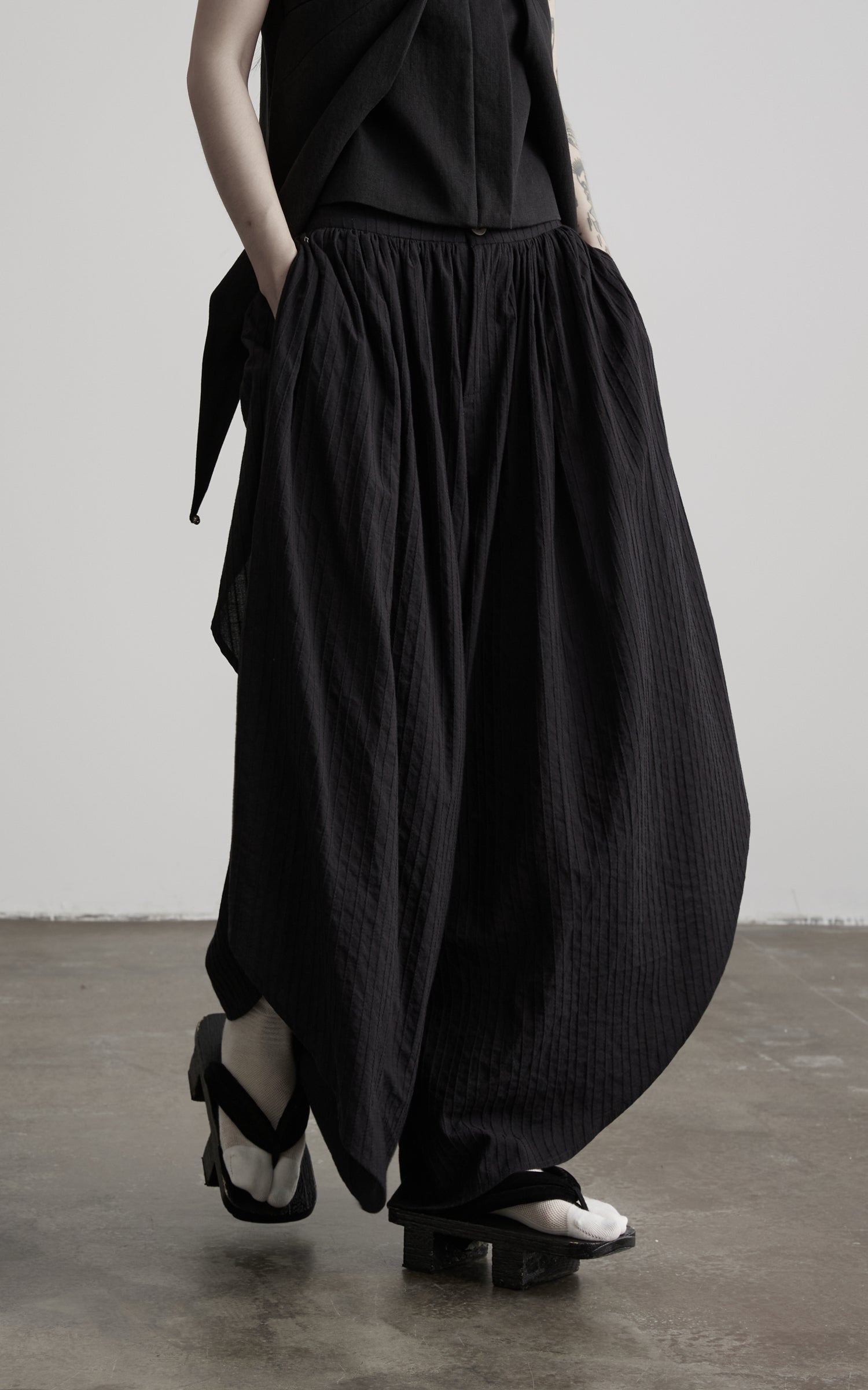 DOINDULGE Asymmetric Textured Wide-Leg Palazzo Pants