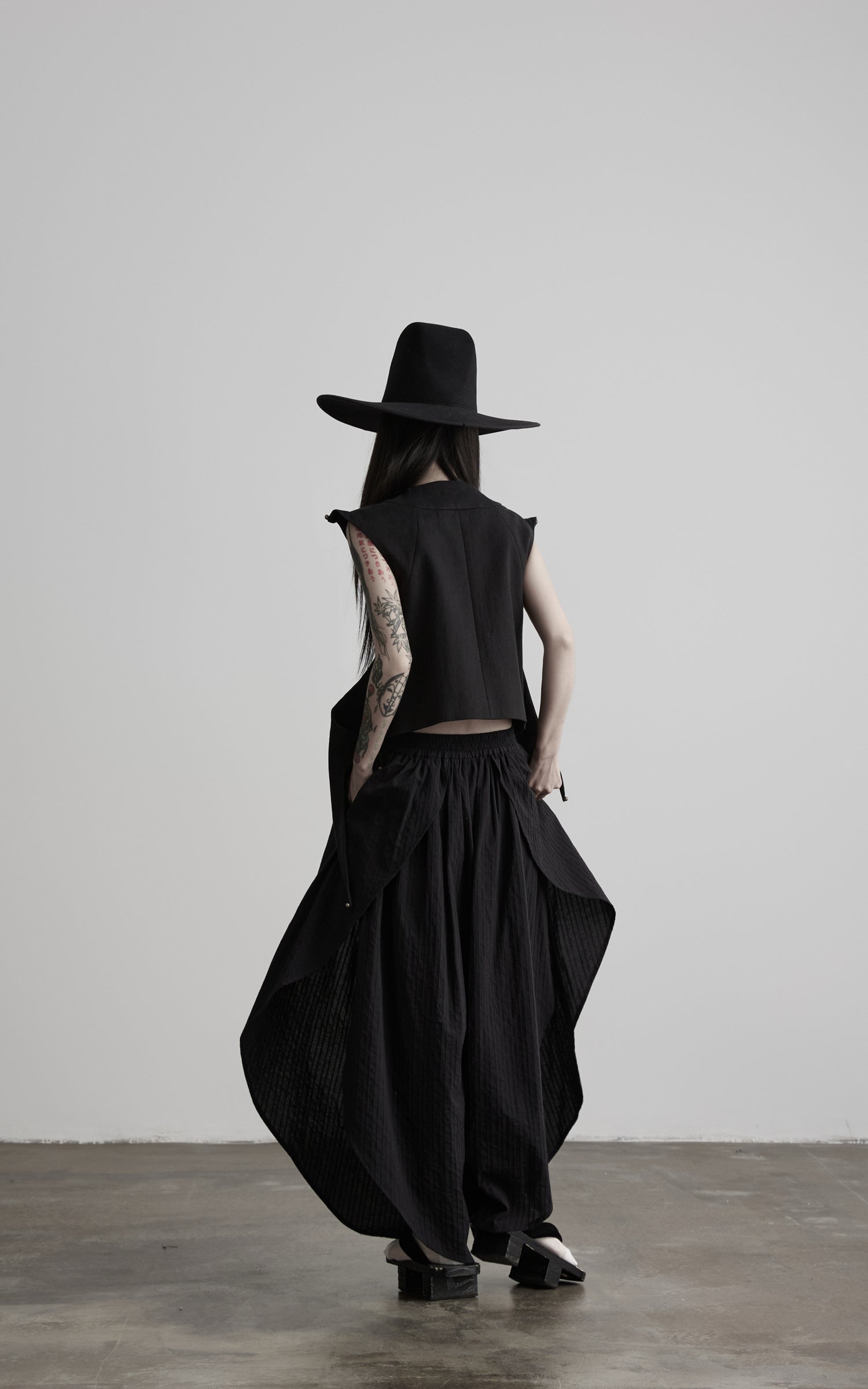 DOINDULGE Asymmetric Textured Wide-Leg Palazzo Pants
