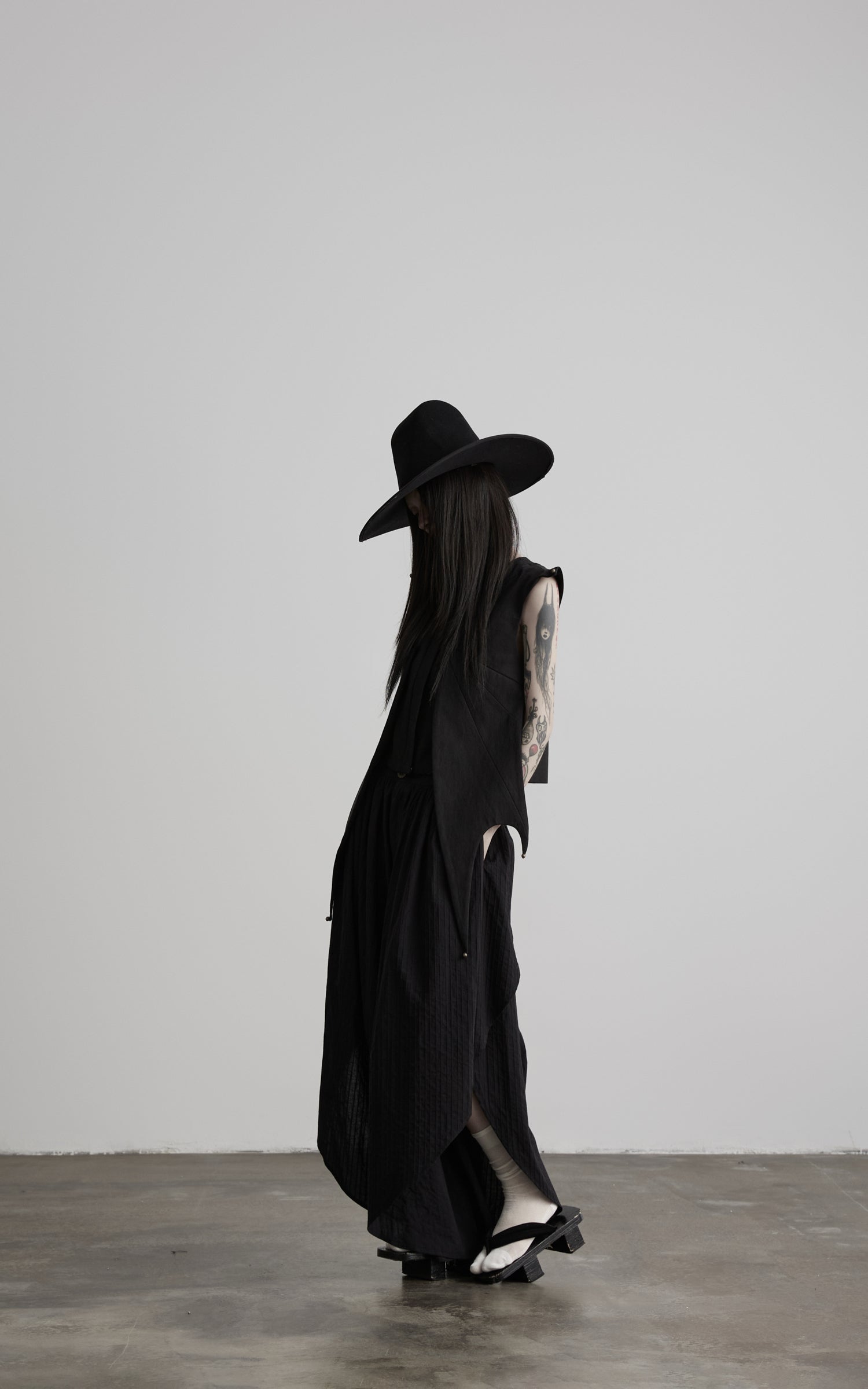 DOINDULGE Asymmetric Textured Wide-Leg Palazzo Pants