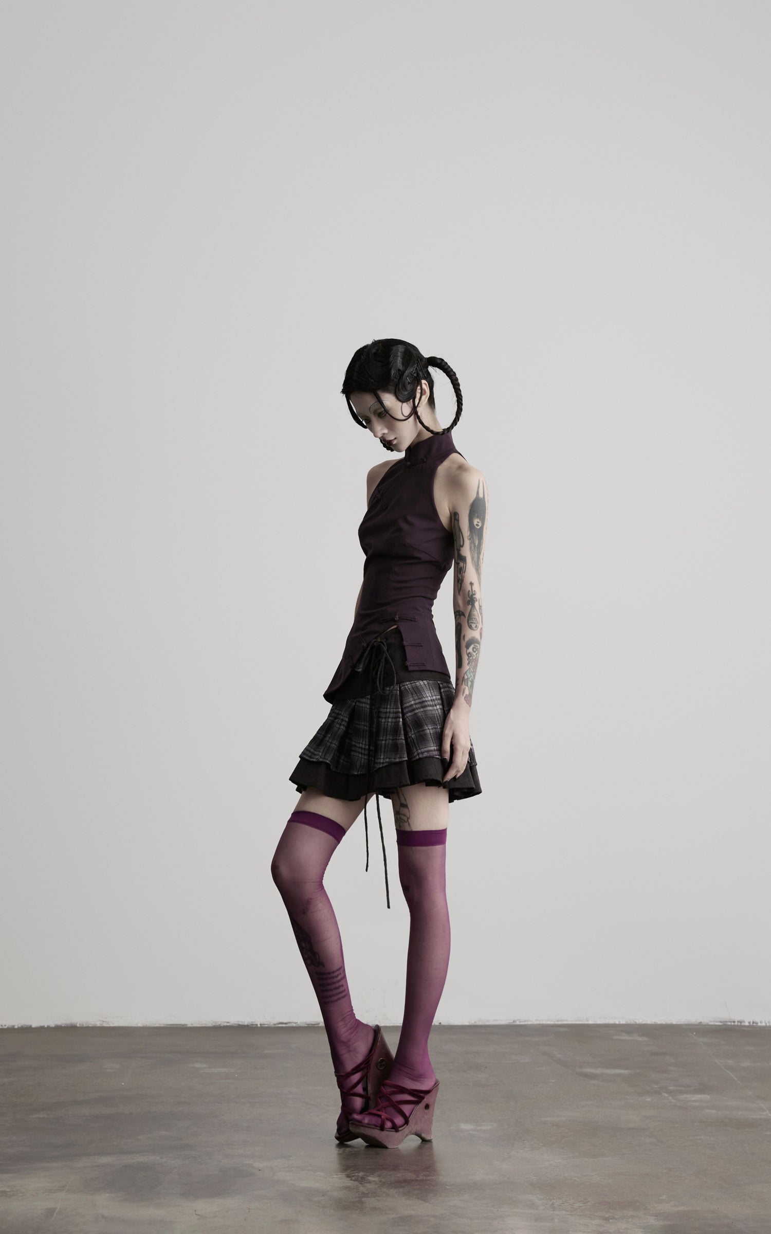 DOINDULGE Lace-Up Layered Pleated Mini Skirt