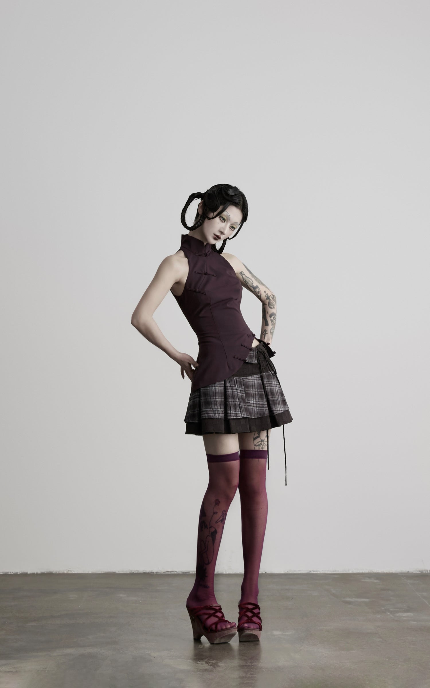 DOINDULGE Lace-Up Layered Pleated Mini Skirt