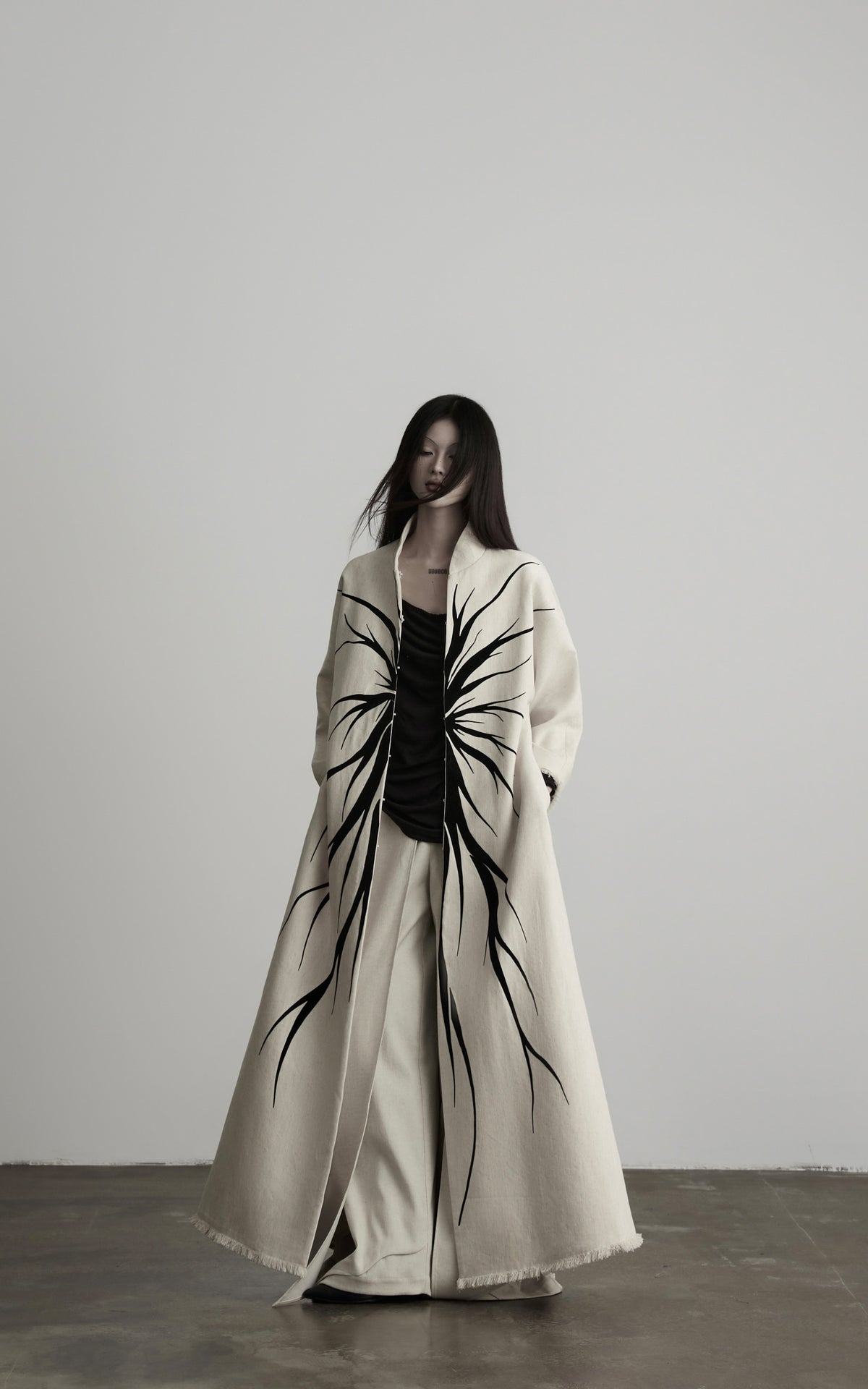 DOINDULGE Avant-Garde Raw Hem Long Coat