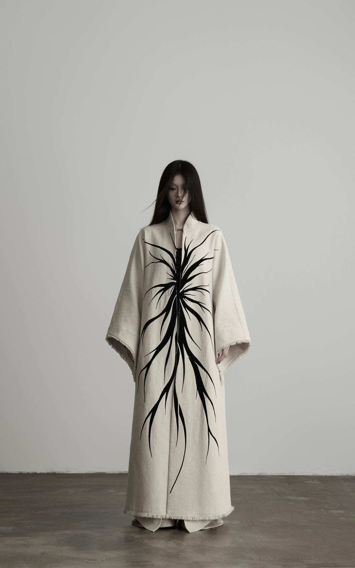 DOINDULGE Avant-Garde Raw Hem Long Coat