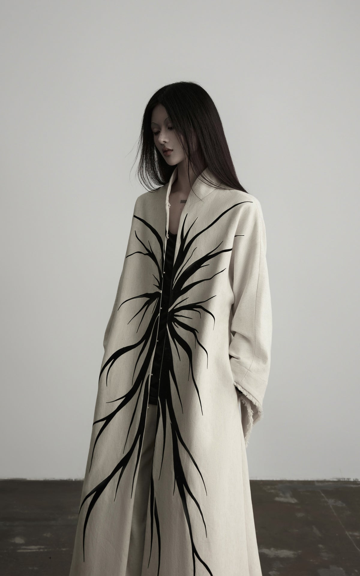 DOINDULGE Avant-Garde Raw Hem Long Coat
