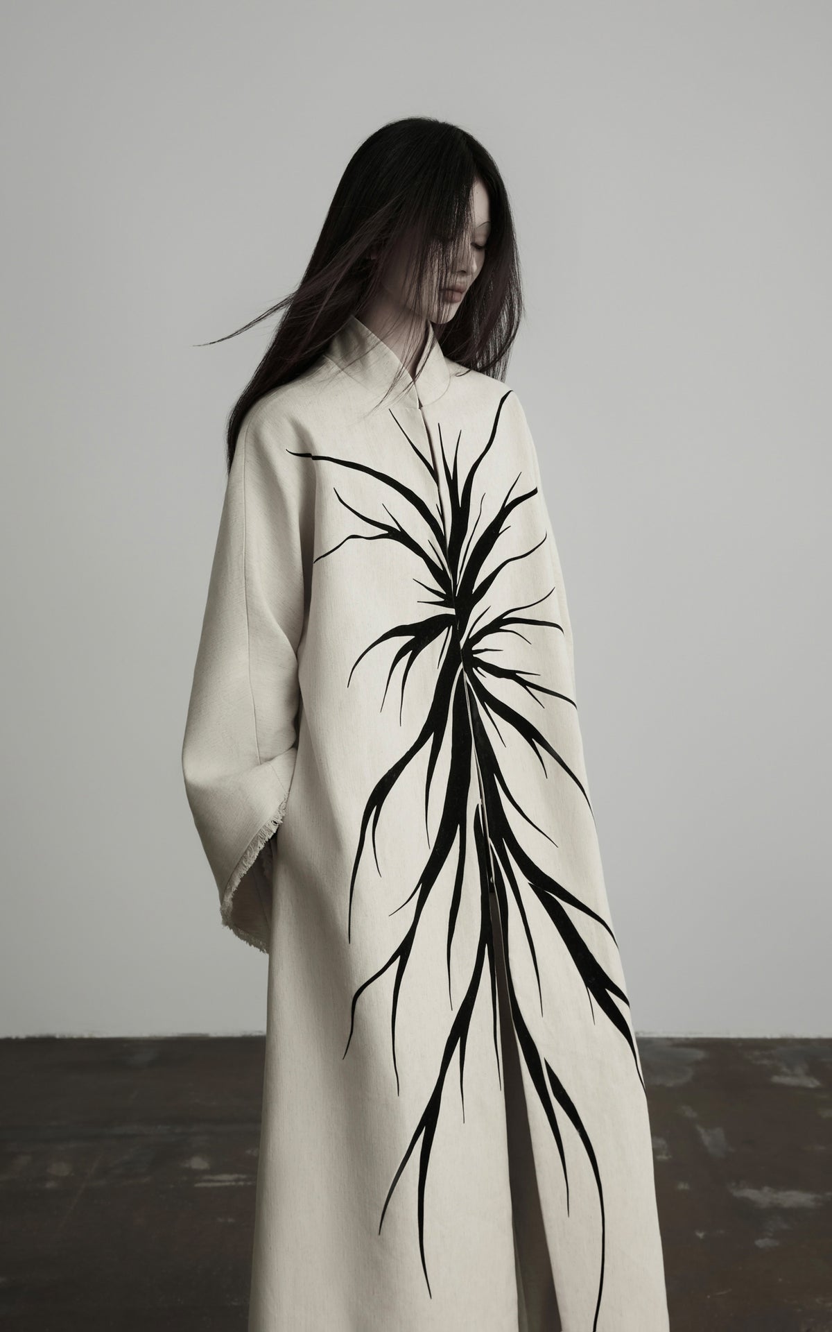 DOINDULGE Avant-Garde Raw Hem Long Coat