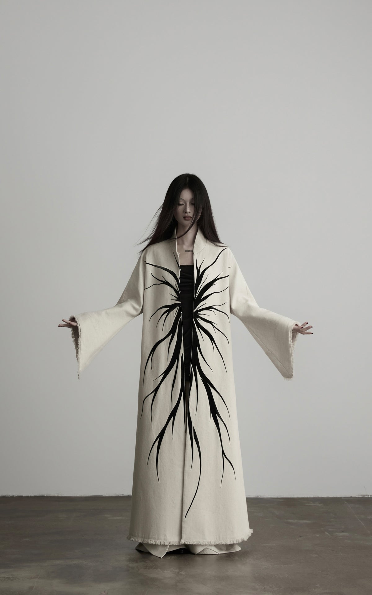 DOINDULGE Avant-Garde Raw Hem Long Coat