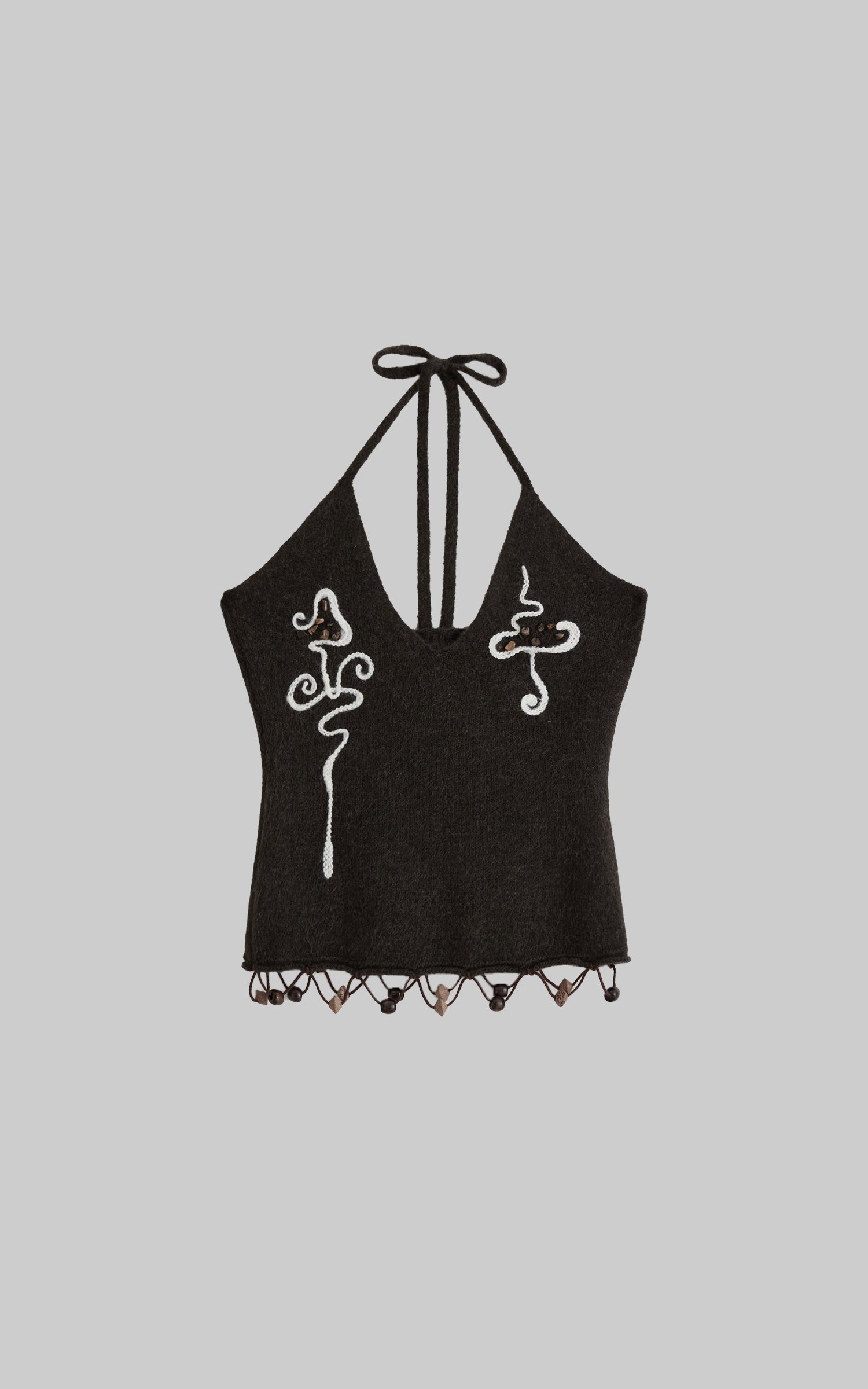 <tc>DOINDULGE</tc> Vネックハルタ刺繍ニットトップ