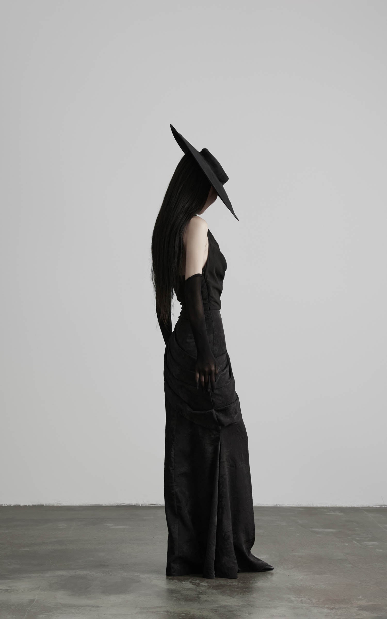 Black halter cowl neck maxi dress angled front view