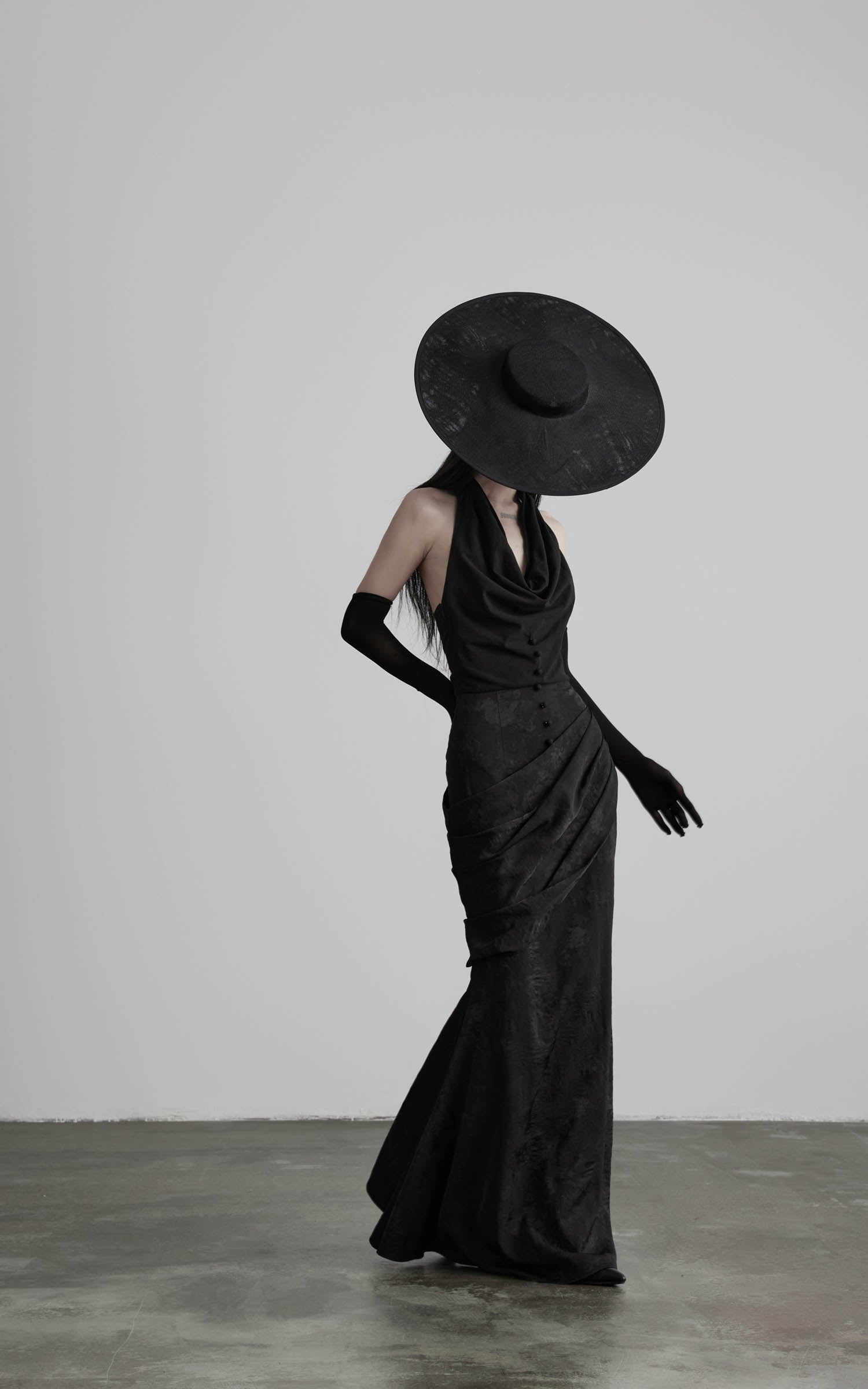 Black halter cowl neck maxi dress side profile view