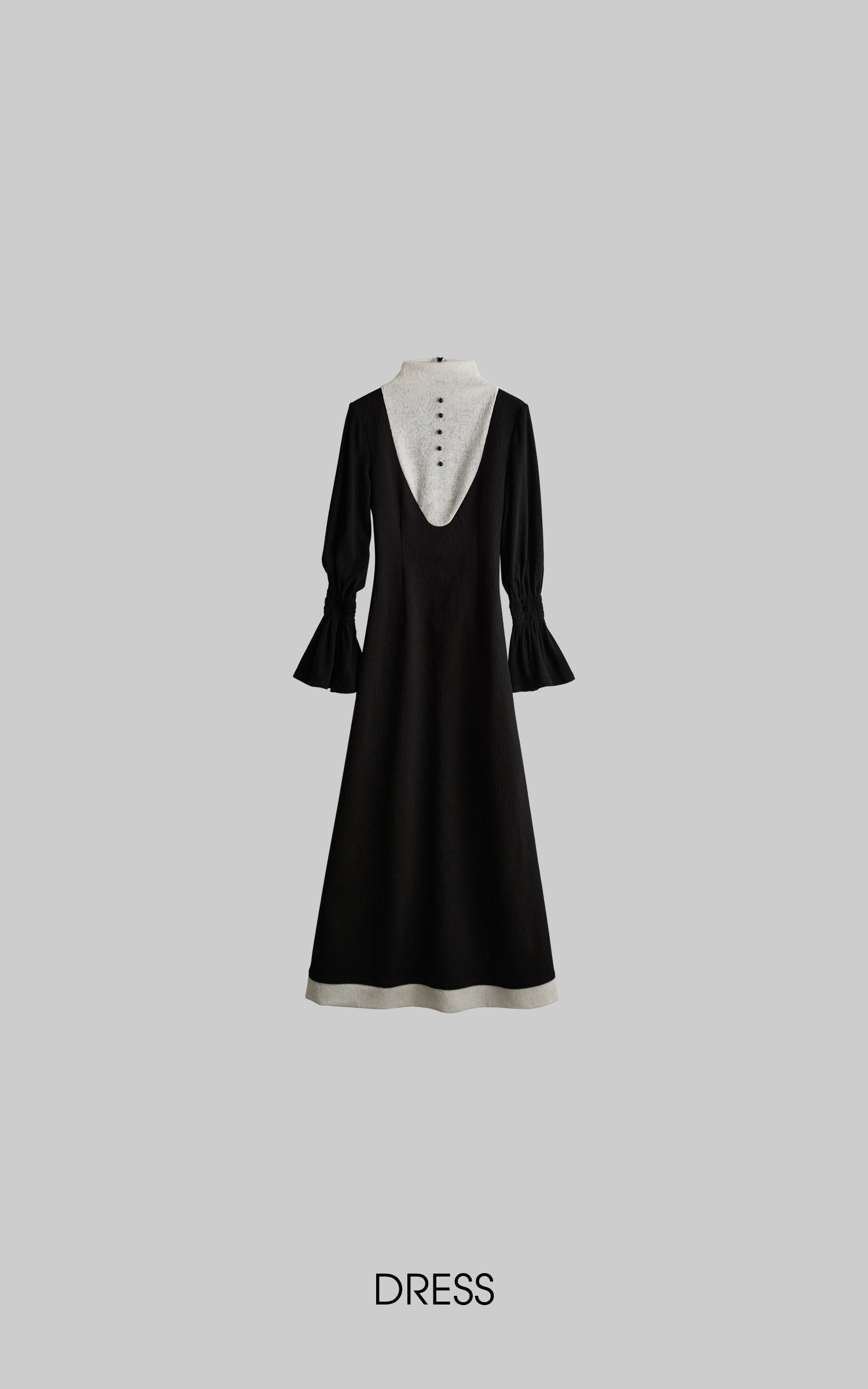 front view of black contrast panel high neck dress laid flat
