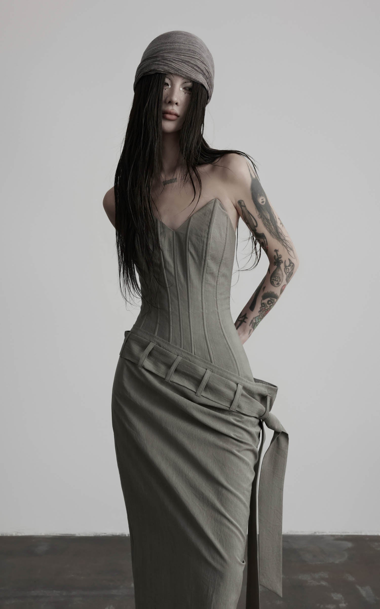 Gray corset wrap maxi dress with gathered wrap drape angled view