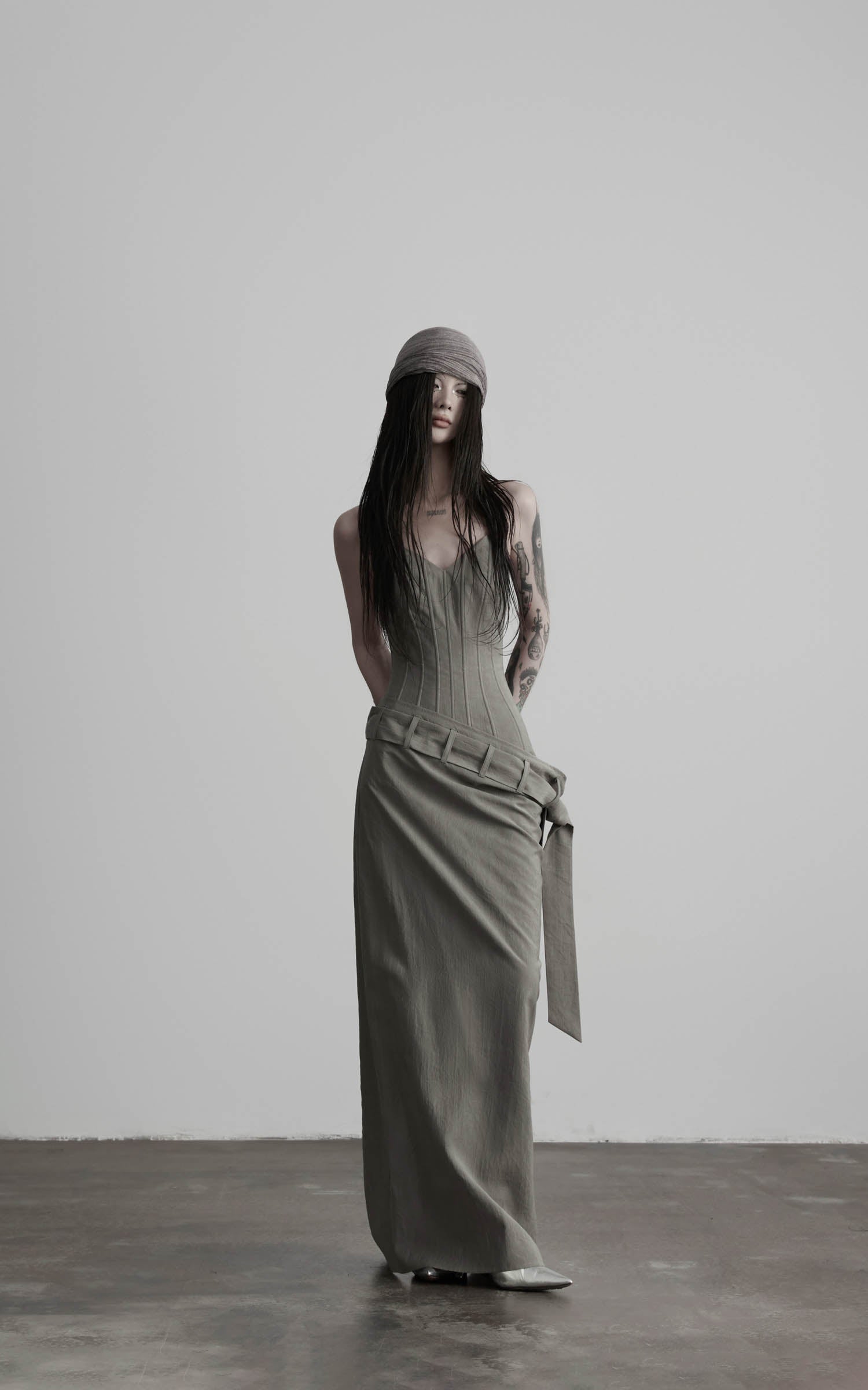 Gray corset wrap maxi dress with elongated column silhouette front view