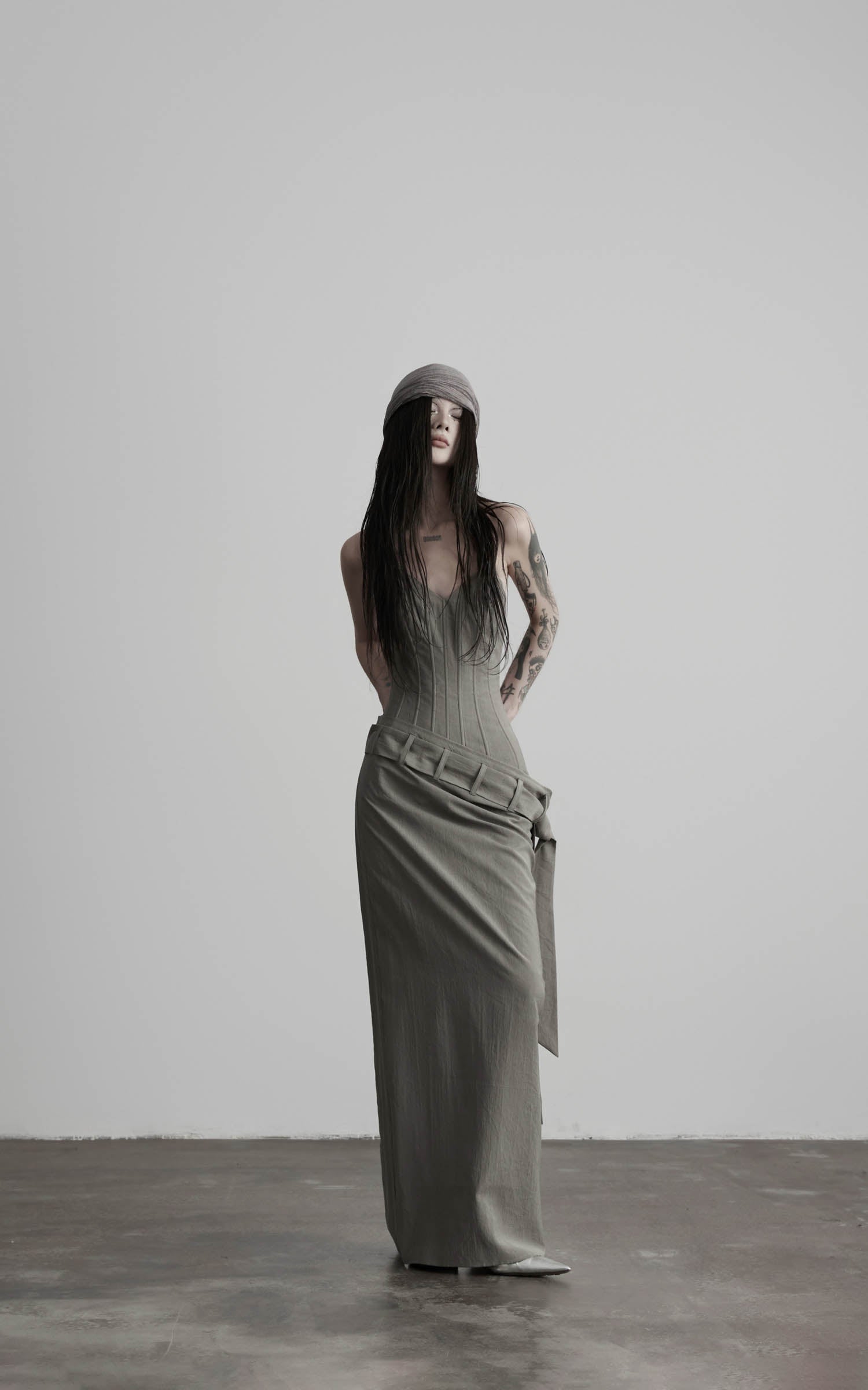 Gray corset wrap maxi dress with slim bodice and maxi length front view