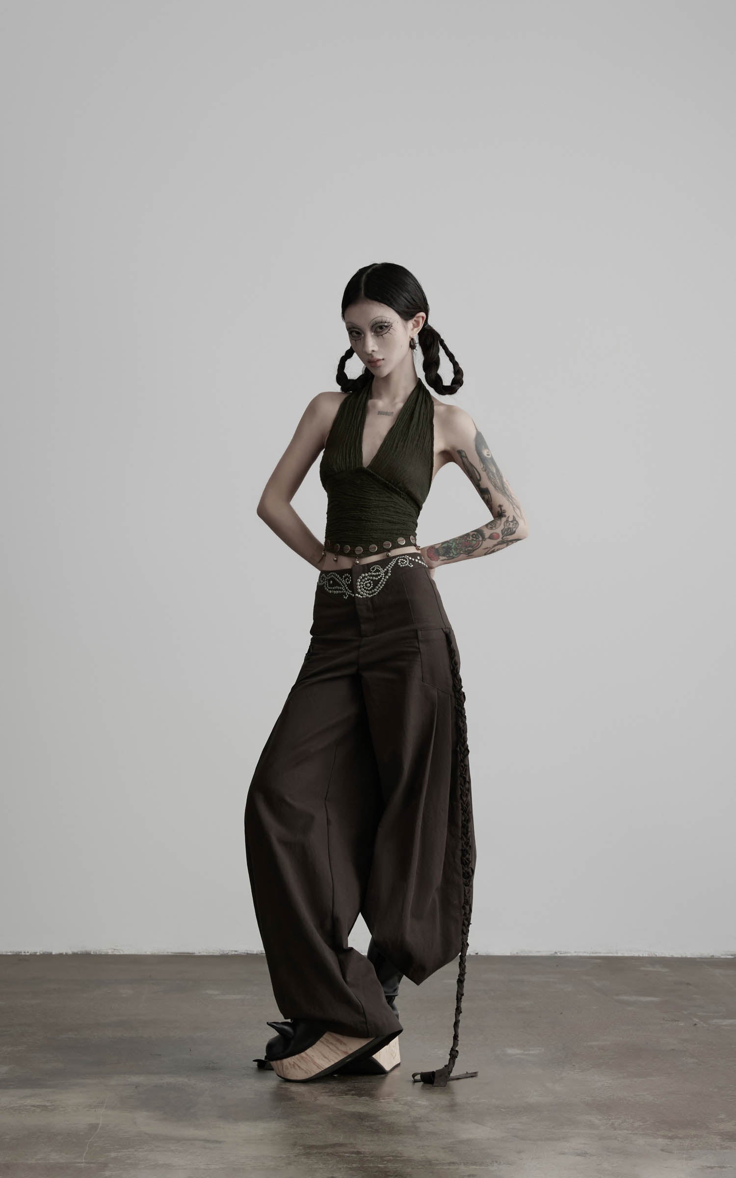Dark coffee rhinestone wide leg pants angled front view