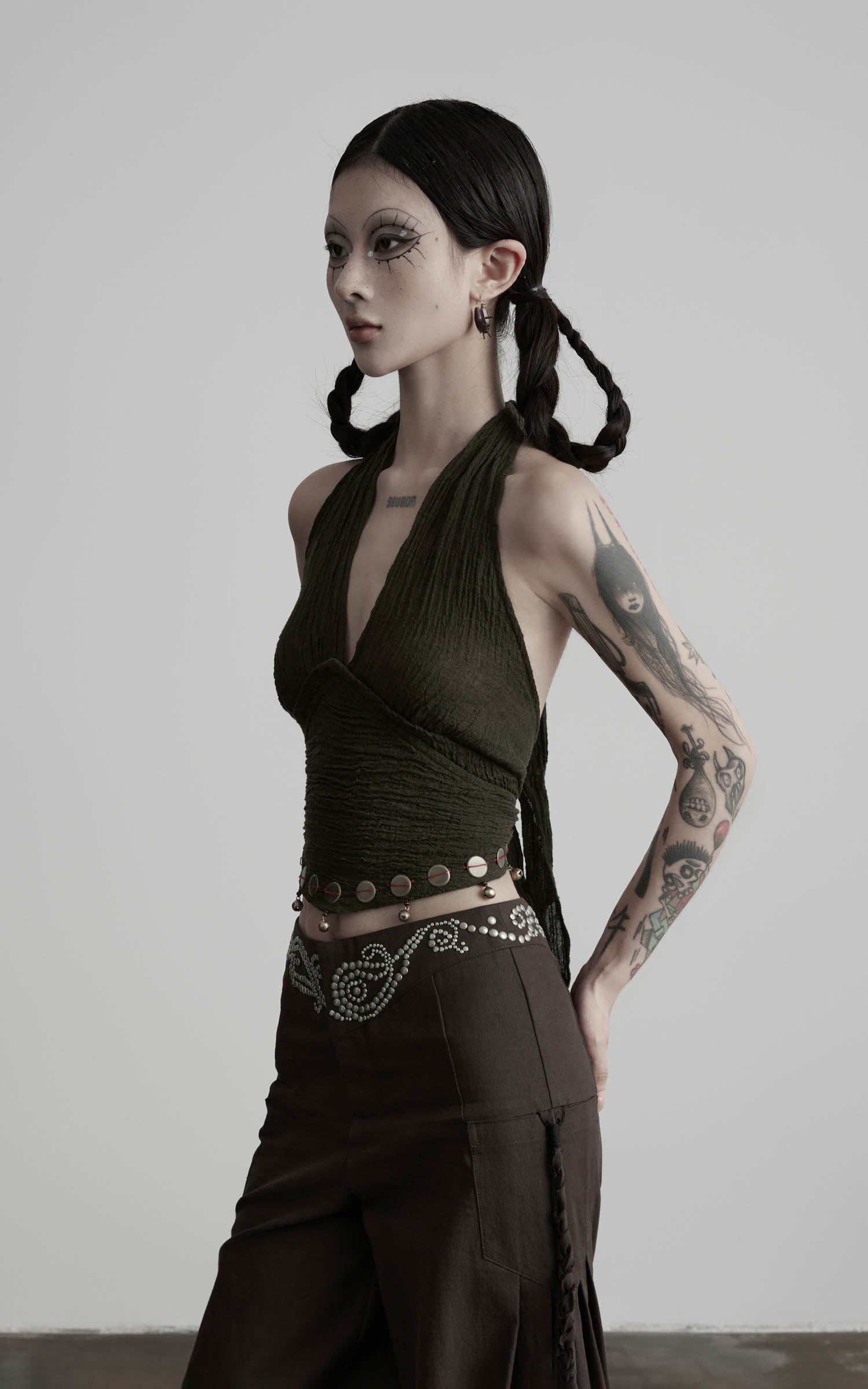 Dark olive halter tie-up crop top angled upper body detail