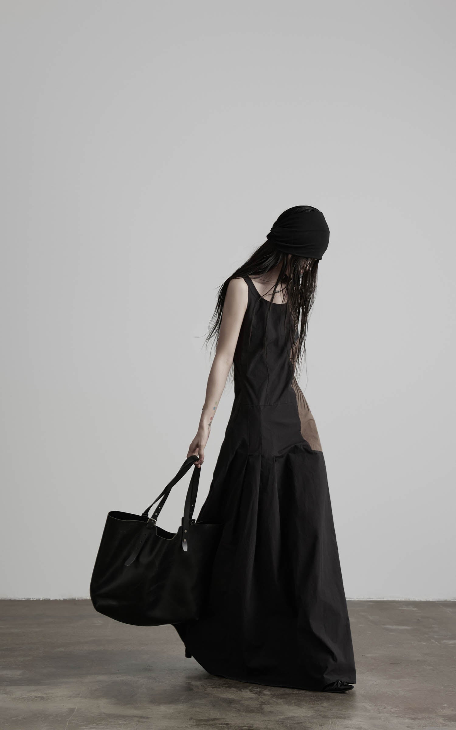 Black embroidered square neck maxi dress with soft hem movement side view