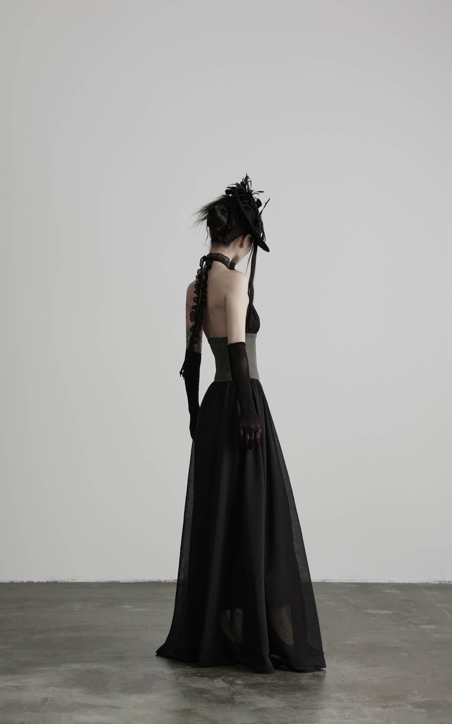Black gathered halter corset maxi dress with open back construction back view