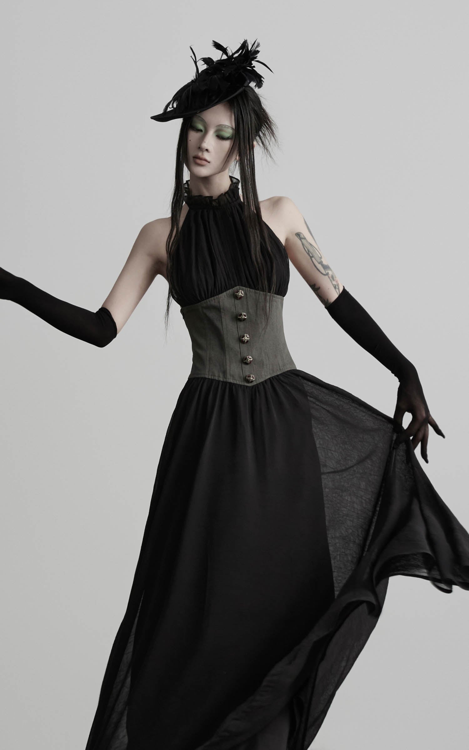 Black gathered halter corset maxi dress with buttoned corset waist front view