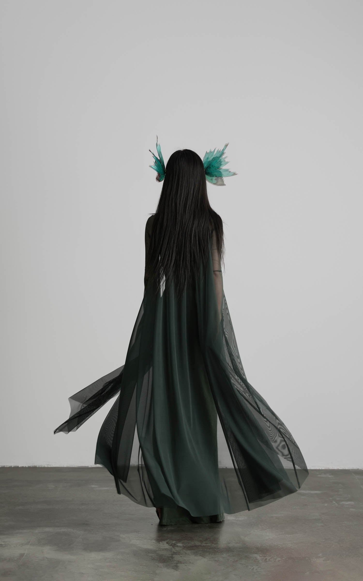 Dark green slip maxi dress with mesh cape back view