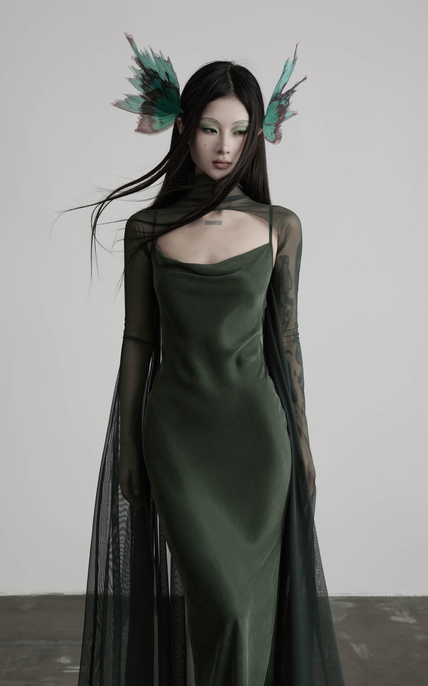Dark green slip maxi dress with mesh cape upper front detail